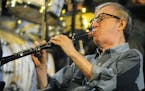 U.S. film director and actor Woody Allen plays clarinet during a concert of his Band in Prague, Saturday, Dec. 20, 2008.