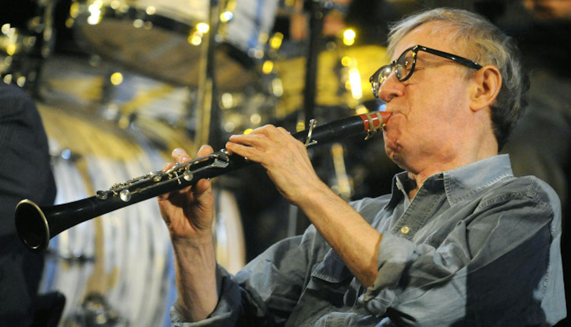 U.S. film director and actor Woody Allen plays clarinet during a concert of his Band in Prague, Saturday, Dec. 20, 2008.