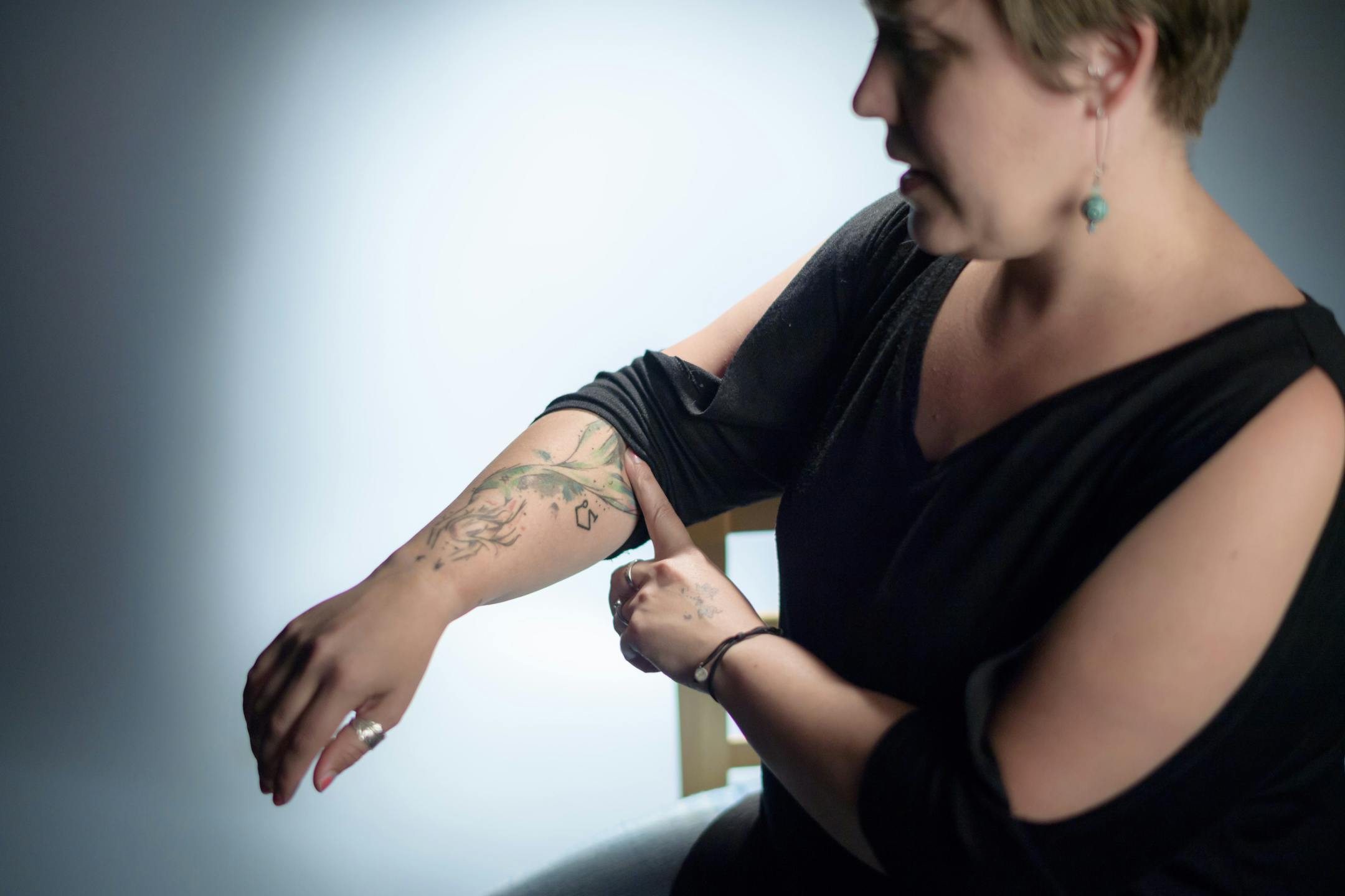 A student once told Lindsay Walz, a survivor of the 35W bridge collapse, that she must have been saved by mermaids at the bottom of the Mississippi River. The idea resonated with her. A few years ago, on the anniversary of the collapse that almost took her life, she got a tattoo of a mermaid on her right arm.