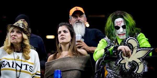 A group of dejected Saints fans showed their displeasure following Sunday's win by the Vikings in New Orleans.