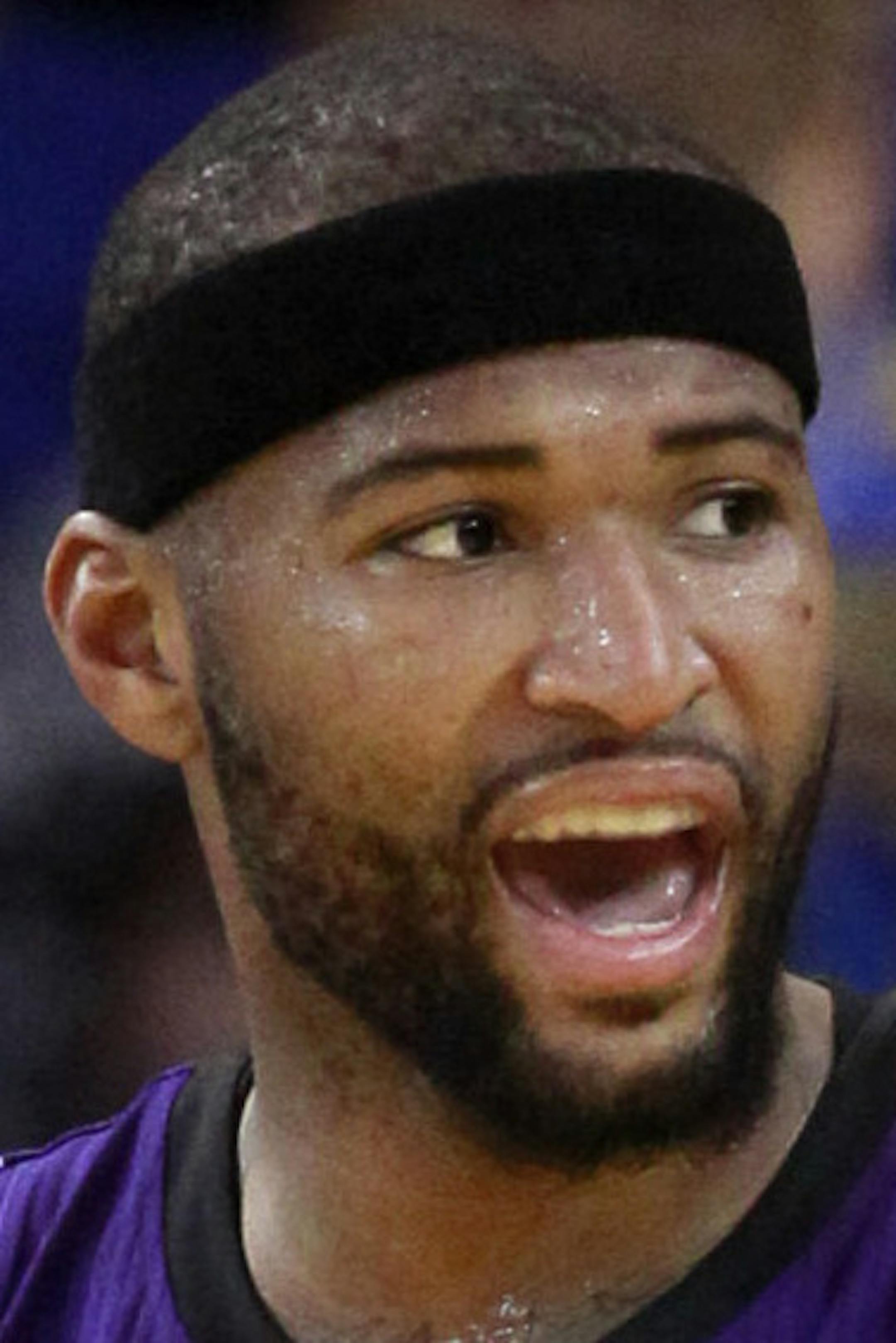 Sacramento Kings' DeMarcus Cousins (15) argues a call against the Golden State Warriors during the second half of an NBA basketball game Monday, Dec. 22, 2014, in Oakland, Calif. Golden State won 128-108.(AP Photo/Marcio Jose Sanchez)