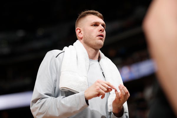Minnesota Timberwolves center Cole Aldrich (45) in the first half of an NBA basketball game Thursday, April 5, 2018, in Denver. (AP Photo/David Zalubo