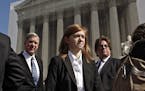 FILE -- Abigail Fisher waits in front of the Supreme Court to speak to the media after the Justices heard the arguments surrounding the affirmative ac
