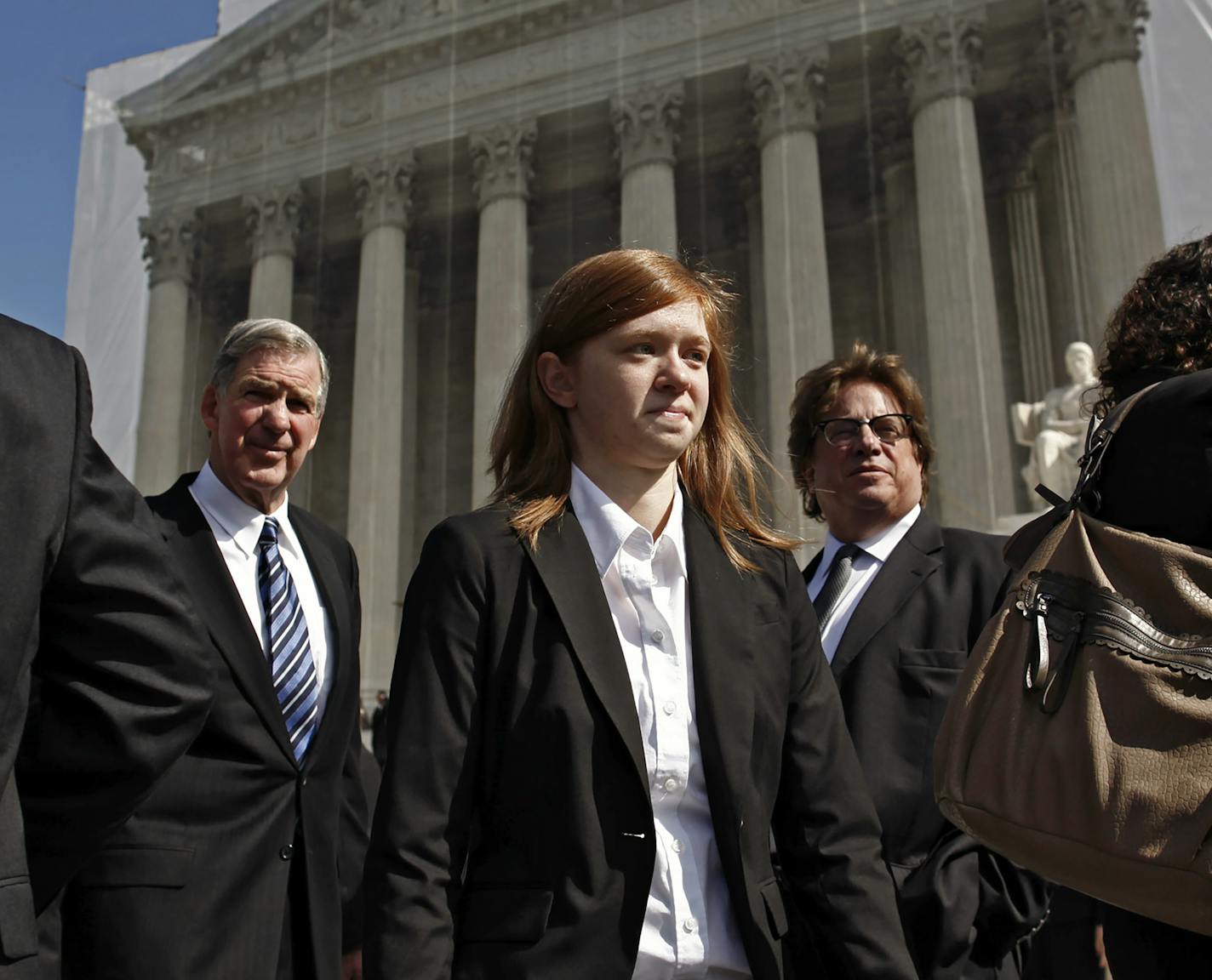 FILE -- Abigail Fisher waits in front of the Supreme Court to speak to the media after the Justices heard the arguments surrounding the affirmative action case Fisher v. University of Texas, in Washington, Oct. 10, 2012. The Supreme Court on Thursday June 23, 2016 rejected a challenge, by a 4-3 vote, to a race-conscious admissions program at the University of Texas at Austin, handing supporters of affirmative action a major victory. (Luke Sharrett/The New York Times)