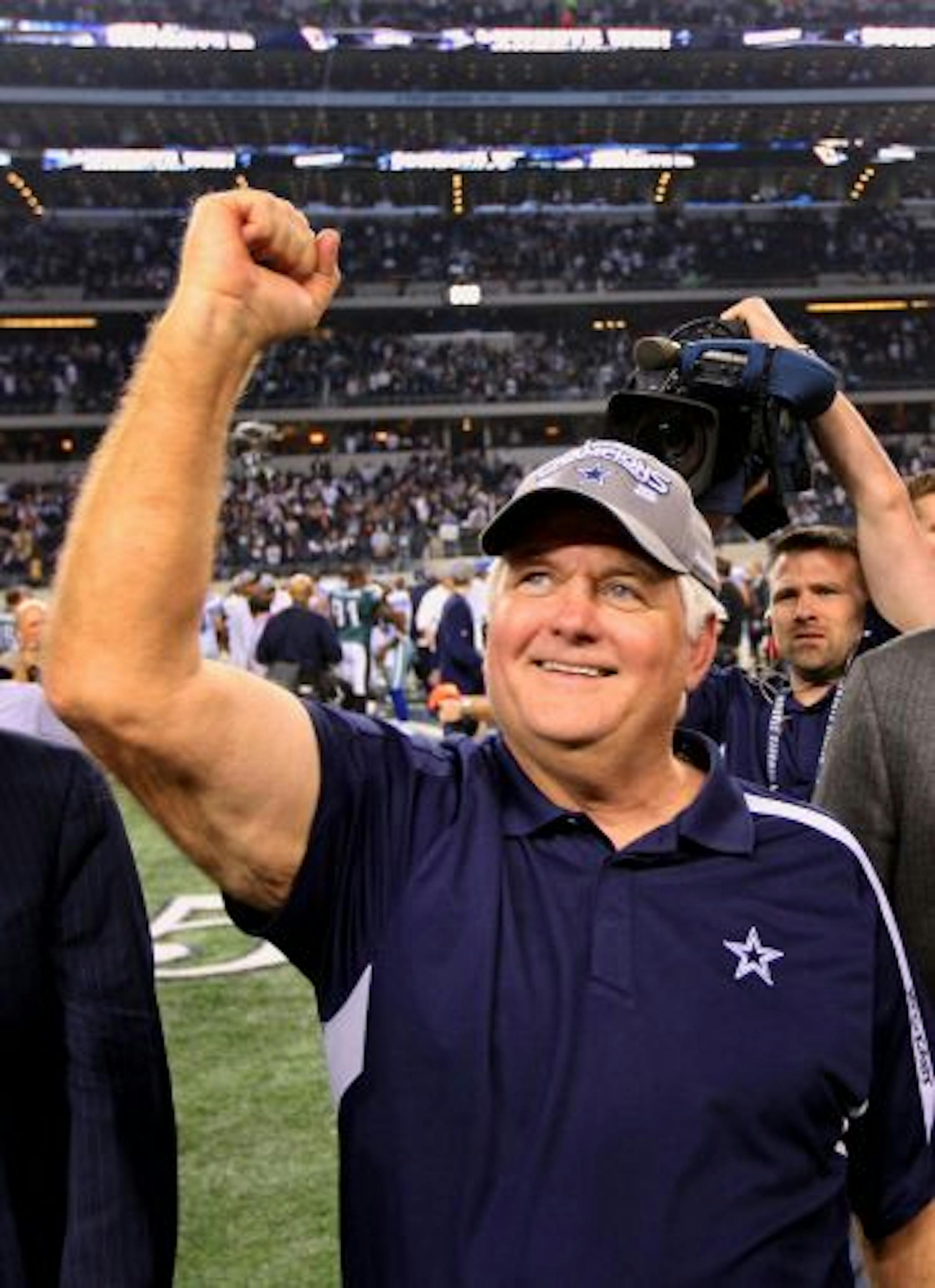 Dallas Cowboys head coach Wade Phillips celebrates a 24-0 victory over the Philadelphia Eagles at Cowboys Stadium in Arlington, Texas, Sunday, January 3, 2010.