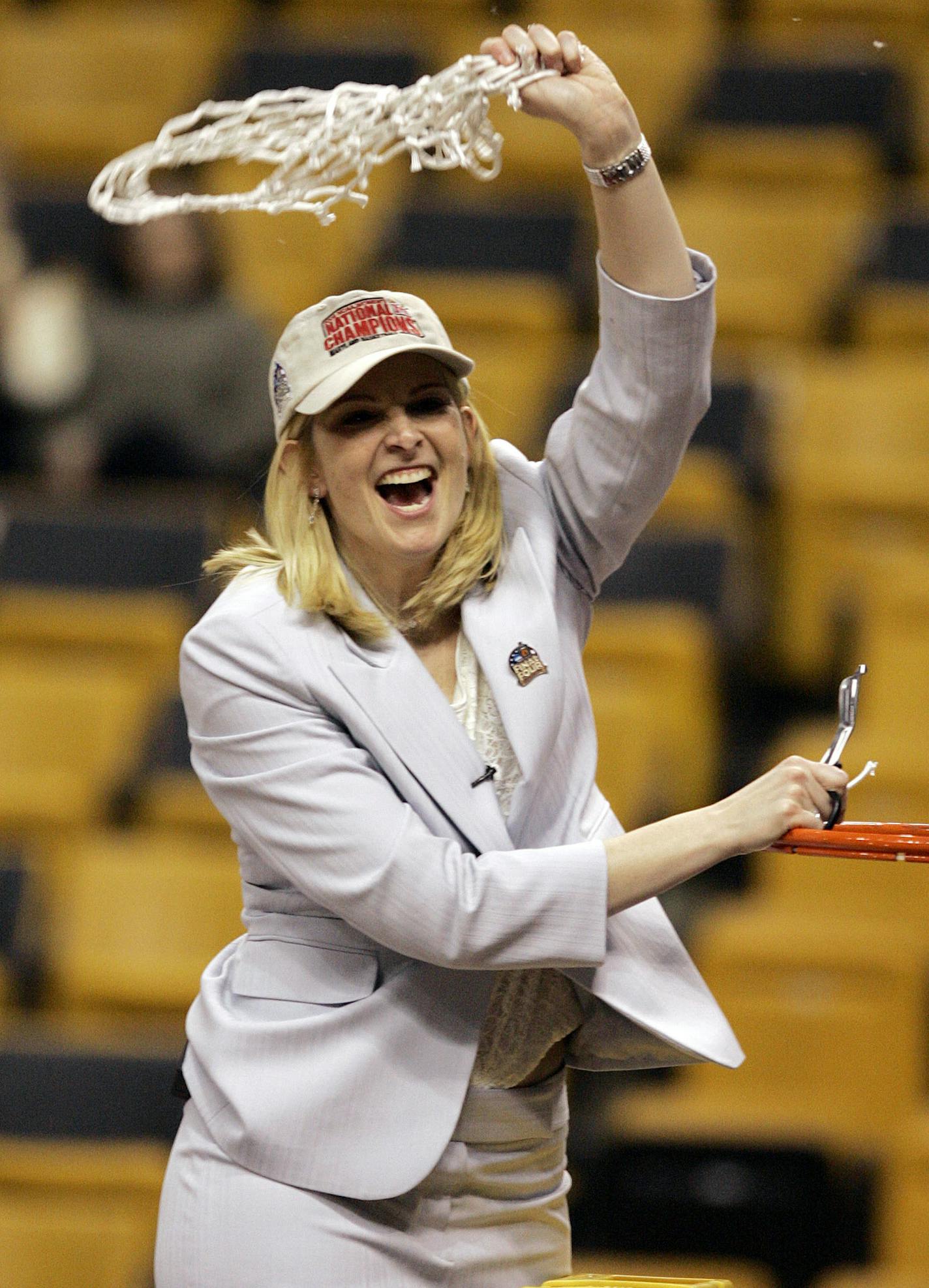 Maryland coach Brenda Frese celebrates after defeating Duke 78-75 to win the NCAA women's Final Four basketball championship game Tuesday, April 4, 2006, in Boston. (AP Photo/Charles Krupa) ORG XMIT: BXG181