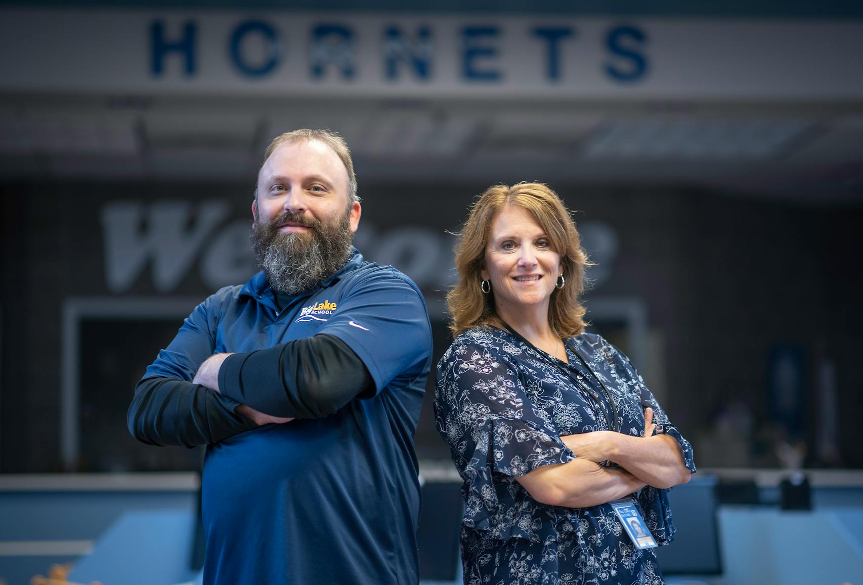 IT coordinator Nathan Hamrin, left, and Big Lake Middle School Assistant Principal Keri Neubauer prepped hundreds of laptops for students at Big Lake High School.