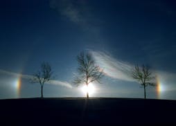 "Who let the sunDOGS out? As the sun crawled into the southeastern sky on the shortest day of the year (Winter Solstice), sundogs, also called mock su