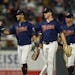 Minnesota Twins players, including left fielder Eddie Rosario (20), center, celebrated their 4-1 win over the Cleveland Indians Saturday night.