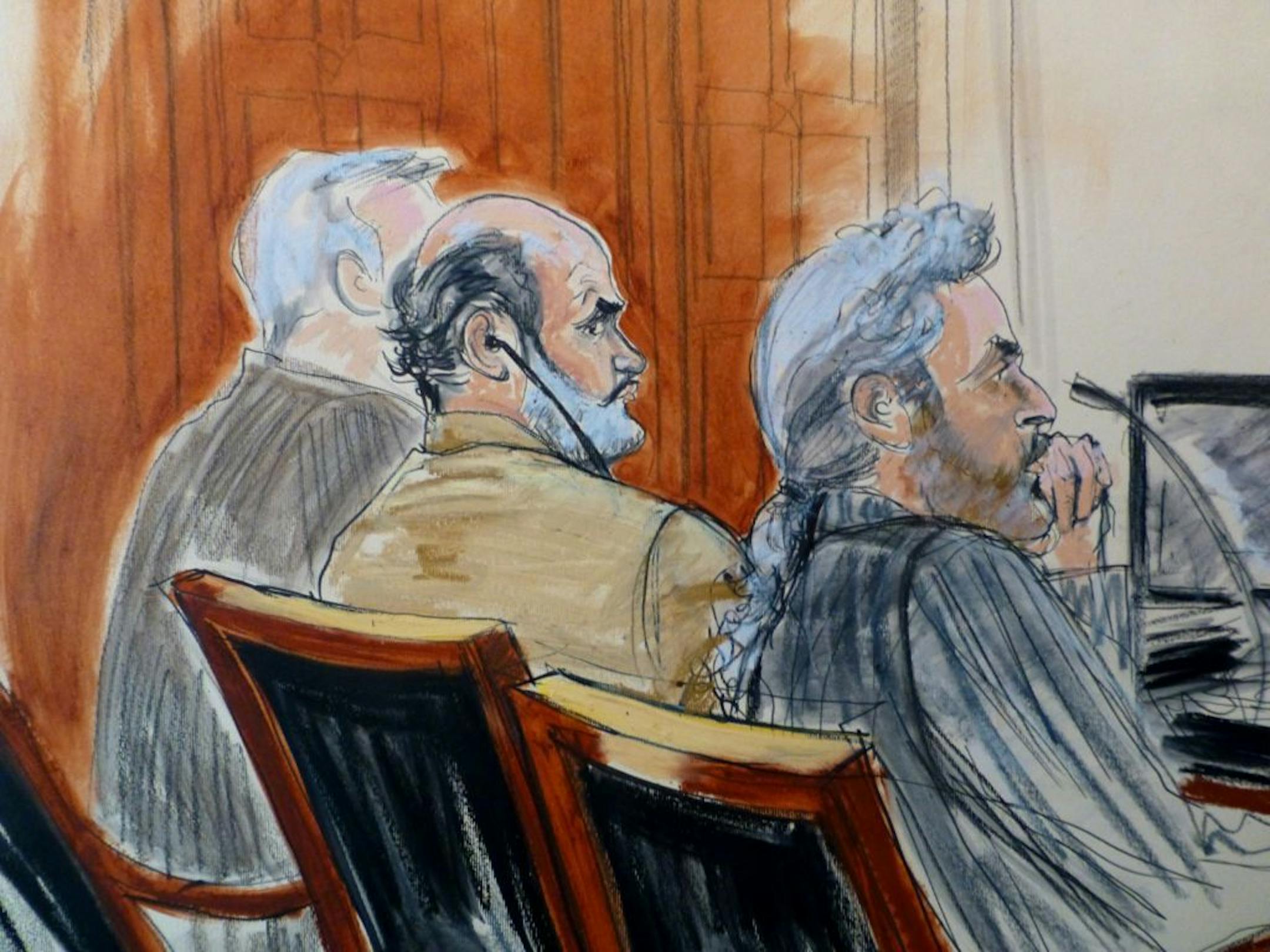 In this courtroom sketch, Sulaiman Abu Ghaith, center, is flanked by his legal team Monday, March 3, 2014 during jury selection at the start of his trial in New York on charges that he conspired to kill Americans and support terrorists.