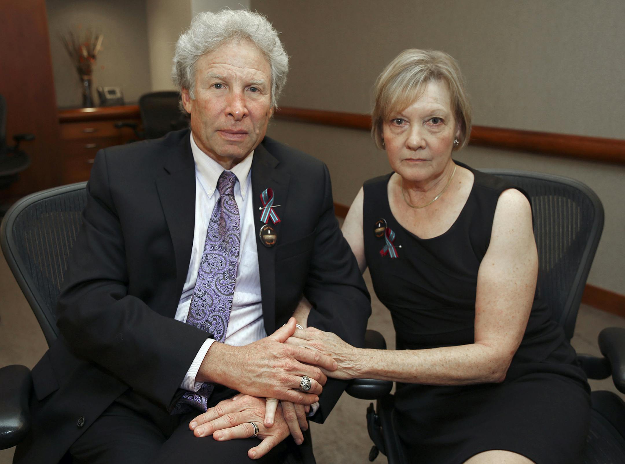 Andy and Barbara Parker, of Collinsville, Va. mourn the loss of their daughter, Alison Parker, a journalist for WDBJ, Friday, Aug. 28, 2015 in Roanoke, Va. Reporter Alison Parker and cameraman Adam Ward were killed by a former colleague during a live broadcast Wednesday, while on assignment in Moneta, Va. (Stephanie Klein-Davis/The Roanoke Times via AP) LOCAL TELEVISION OUT; SALEM TIMES REGISTER OUT; FINCASTLE HERALD OUT; CHRISTIANBURG NEWS MESSENGER OUT; RADFORD NEWS JOURNAL OUT; ROANOKE STAR S