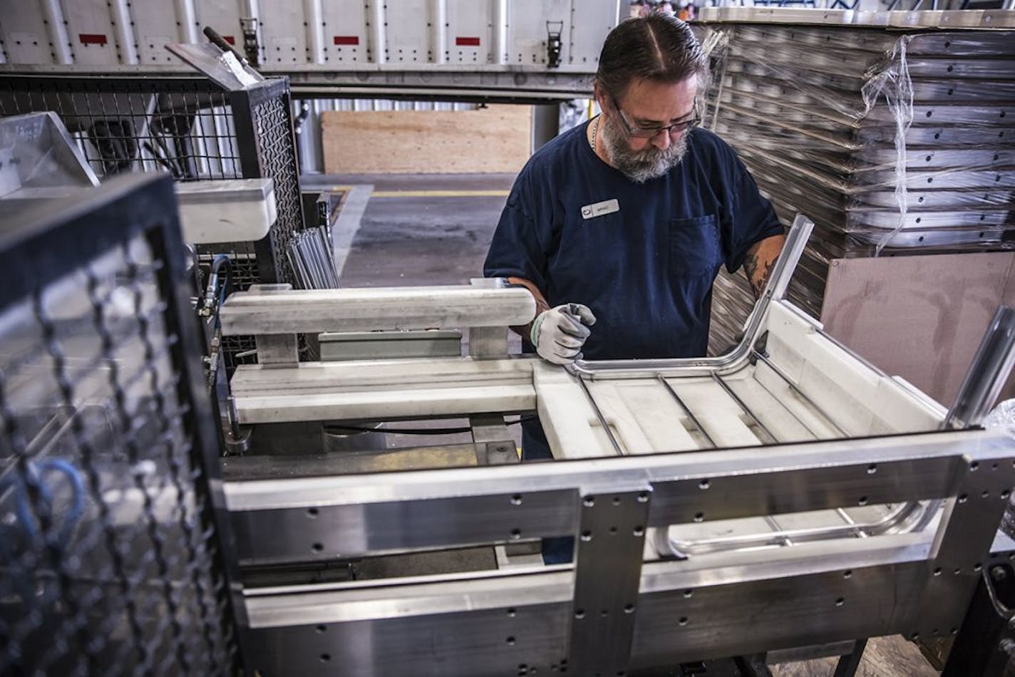 Alexandria Industries� Brad Morgan assembles solar rooftop racking-mounting systems at the central Minnesota plant. Submitted by Alexandria Industries