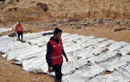 This Monday, Feb. 20, 2017 photo provided by The International Federation of Red Cross and Red Crescent Societies (IFRC), shows bodies of people that 