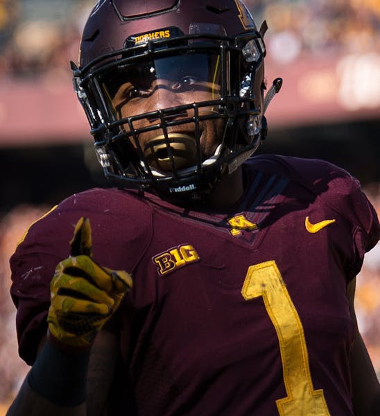 Minnesota Golden Gophers running back Rodney Smith (1) celebrated a rushing touchdown against the Rutgers Scarlet Knights in the first quarter Saturda