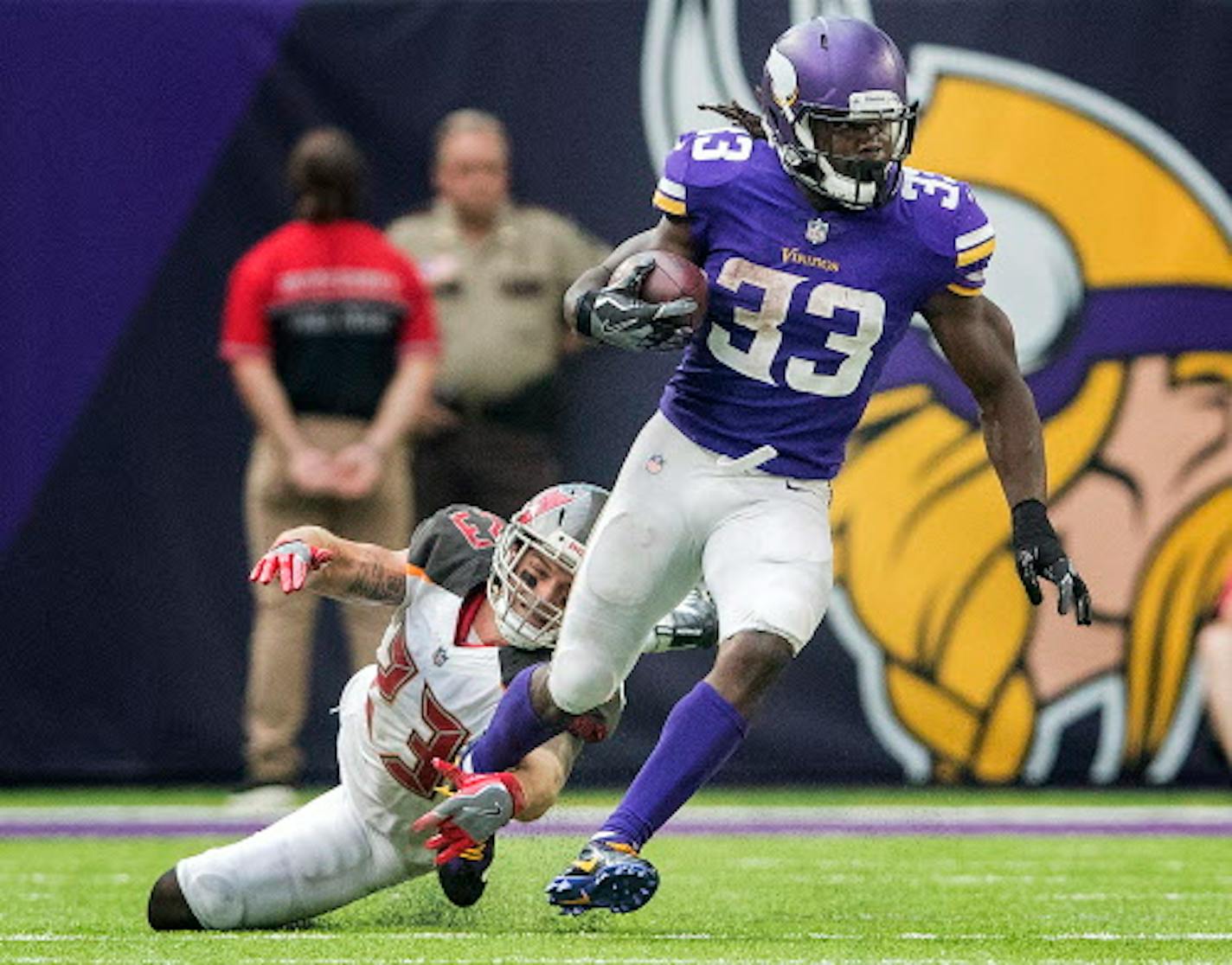 Vikings running back Dalvin Cook (33) during a run in the fourth quarter.