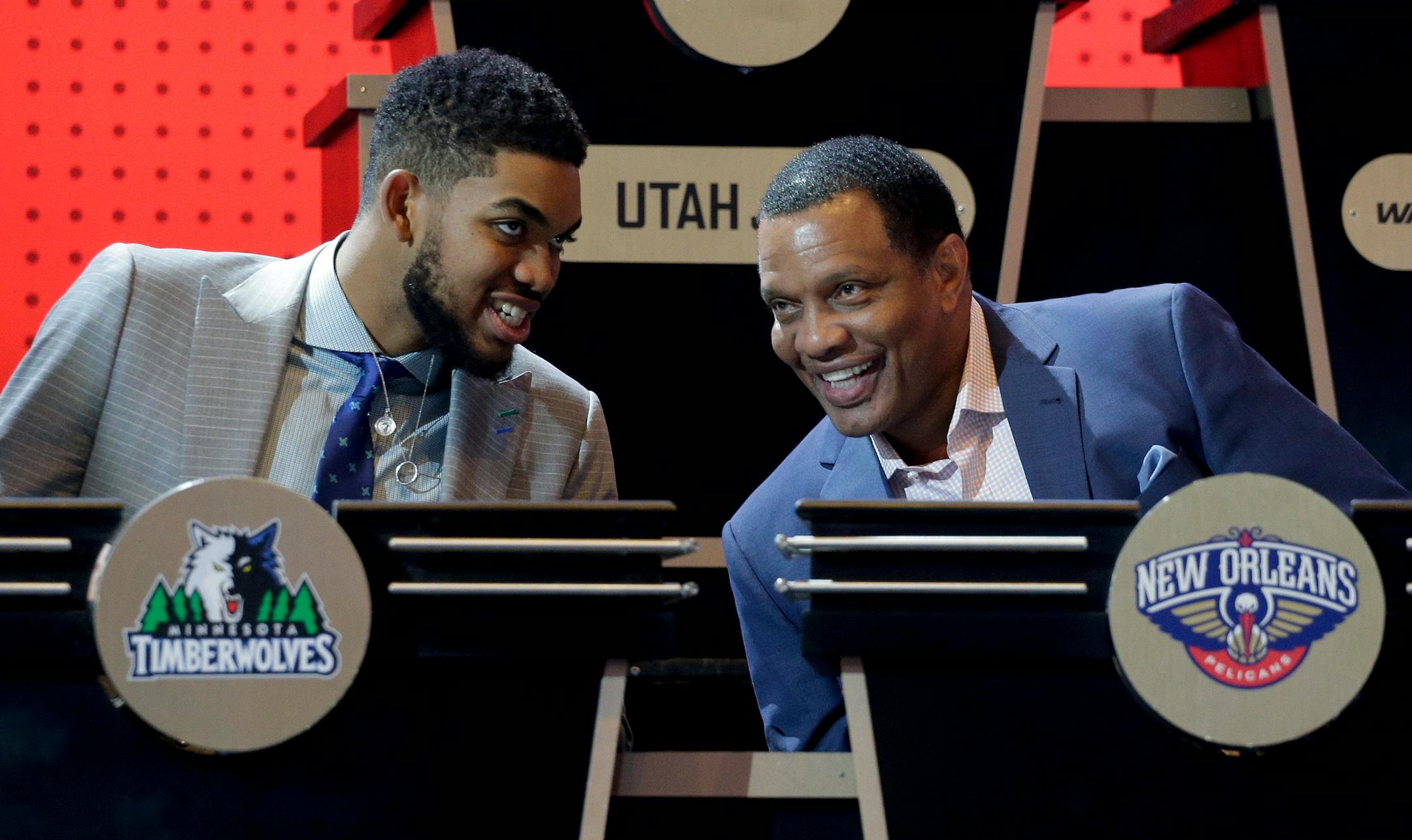 Minnesota Timberwolves center Karl-Anthony Towns, left, talks with New Orleans Pelicans head coach Alvin Gentry before the start of the NBA basketball draft lottery, Tuesday, May 17, 2016, in New York. (AP Photo/Julie Jacobson) ORG XMIT: NYJJ109
