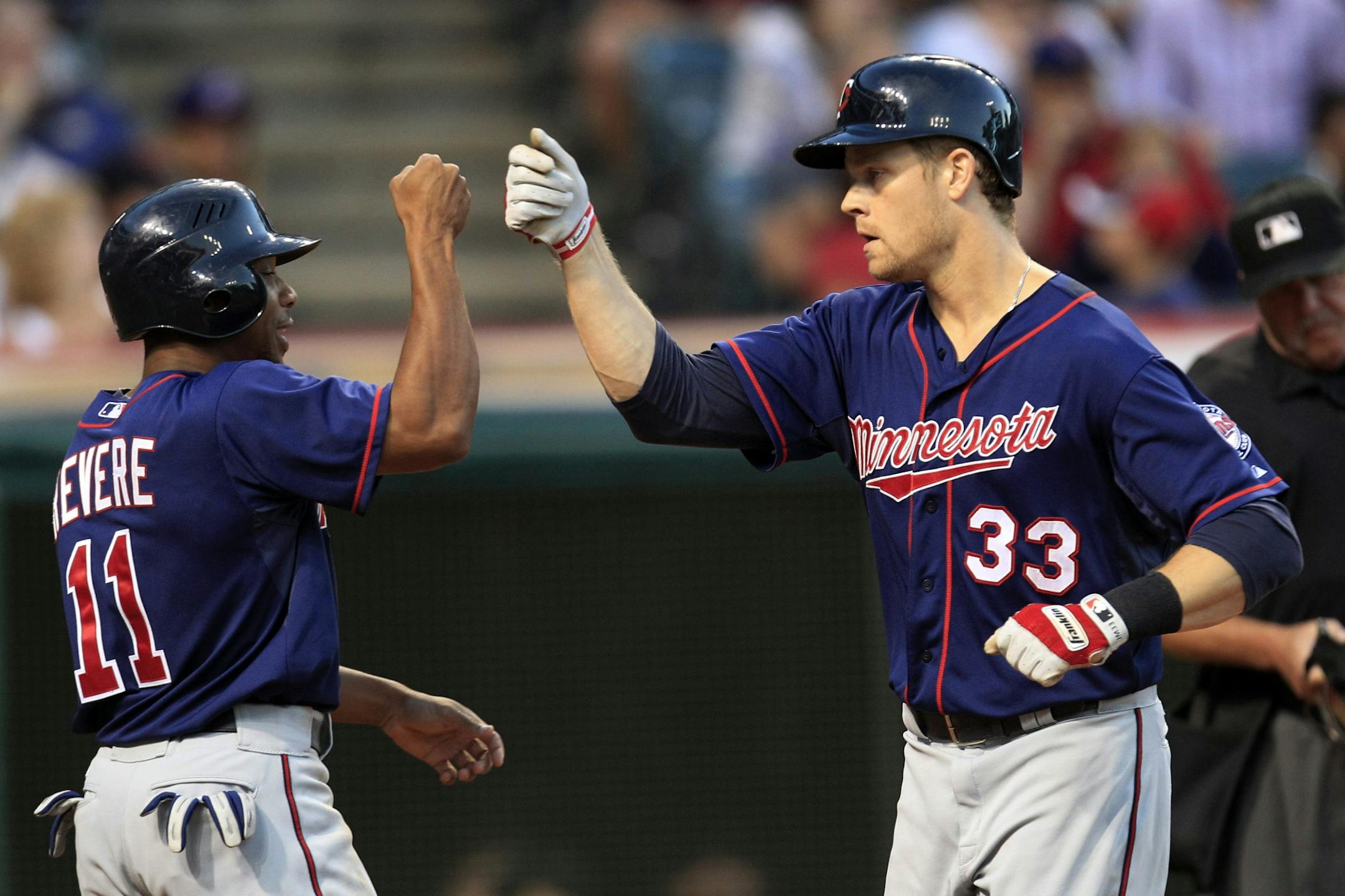 It was a productive Monday for Ben Revere (left) and Justin Morneau; Revere had four hits, while Morneau hit two homers to reach 200 for his career.