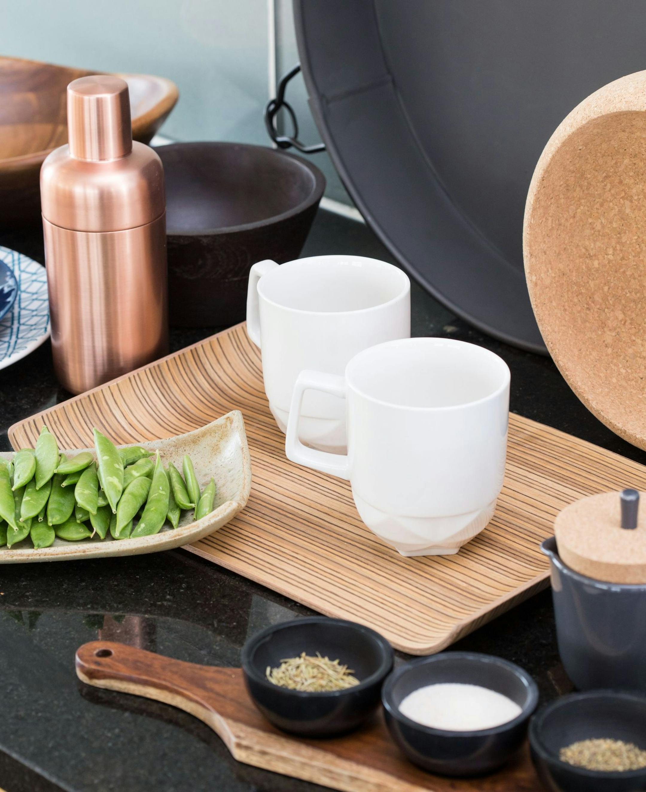 An Asian-inspired aesthetic features natural, sustainable materials like cork and bamboo and simple shapes.