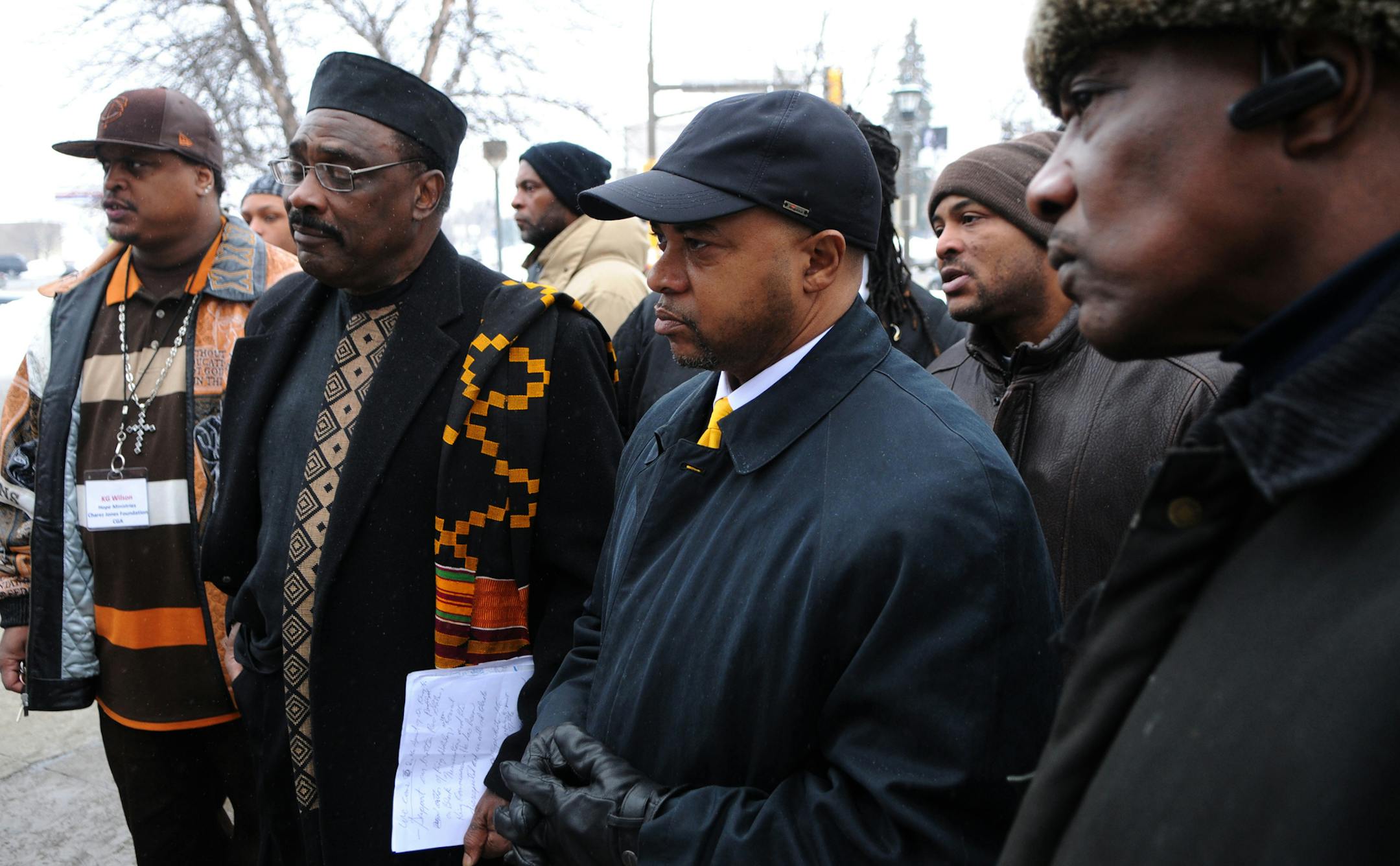 Richard Sennott@startribune.com St Paul Mn. Monday 01/17/11 : ] MLK Jr. holiday was celebrated at Central High School's auditorium, with a march to Concordia University's Gangelhoff Center where black community leaders Randy Staten who is second from the left and Rev. Jerry McAfee of New Salem Baptist Church held a protest outside of the MLK ceremony. Randy Staten was to speak at the Council on Black Minnesotans' event. But concerns on the agency's board led to the invitation being revoked. ORG