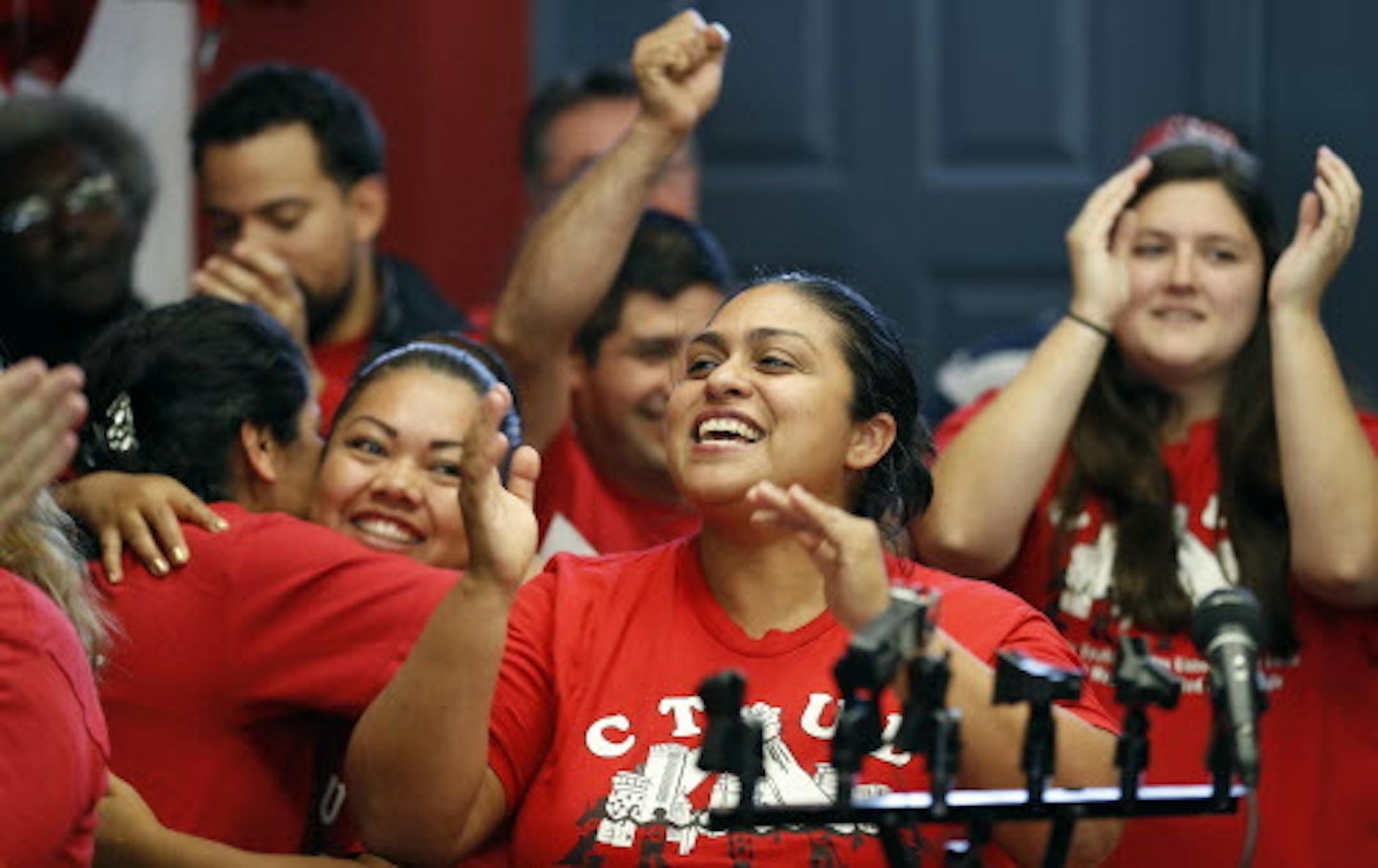 Veronica Mendez Moore celebrated the announcement that janitors who clean Target stores have won the right to organize under the SEIU Local 26 janitors union at the CTUL union hall Thursday October 13, 2016 in Minneapolis, MN. ] Jerry Holt / jerry. Holt@Startribune.com