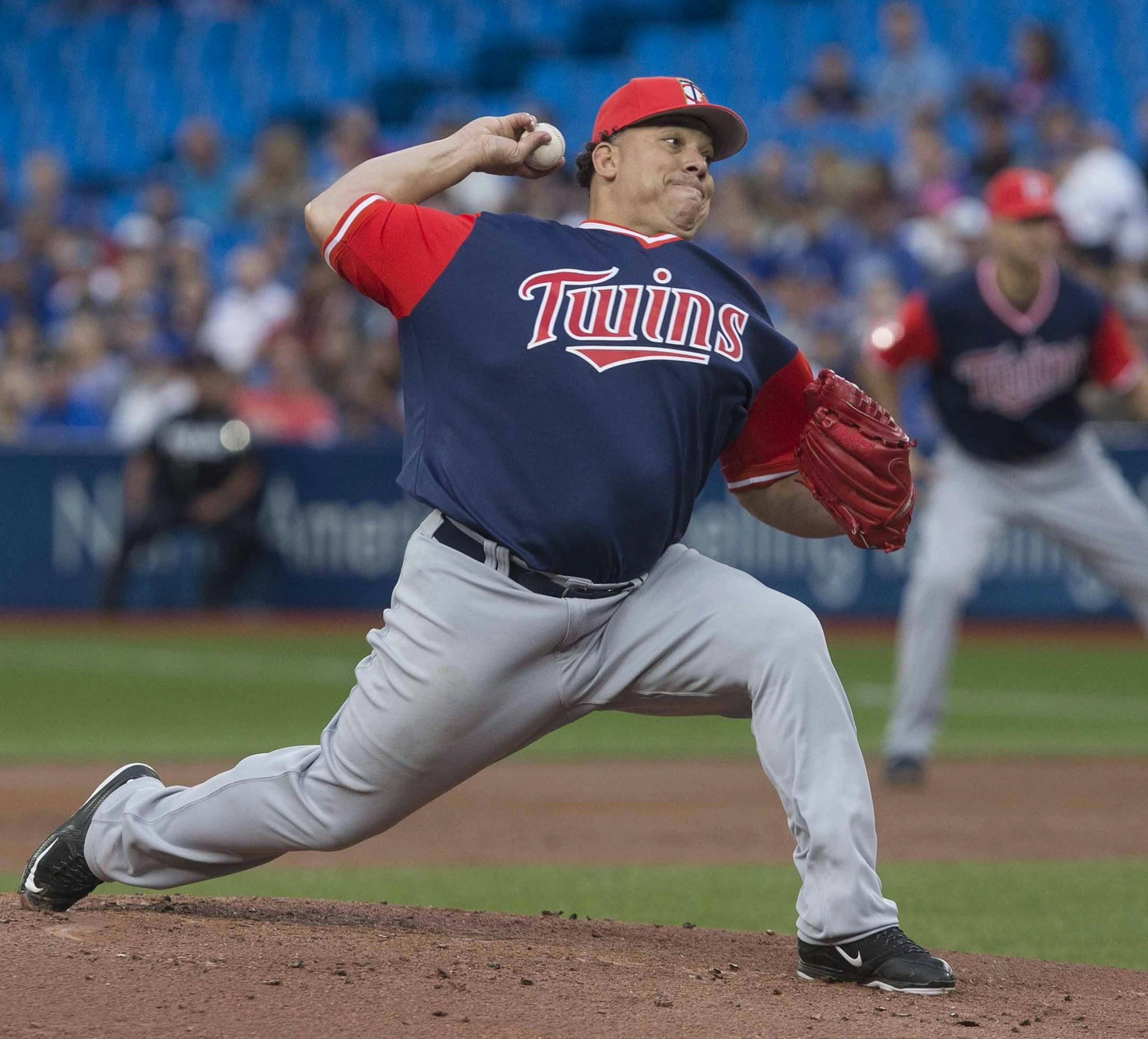 Minnesota Twins starting pitcher Bartolo Colon works against the Toronto Blue Jays during the first inning of a baseball game Friday, Aug. 25, 2017, in Toronto. (Chris Young/The Canadian Press via AP)