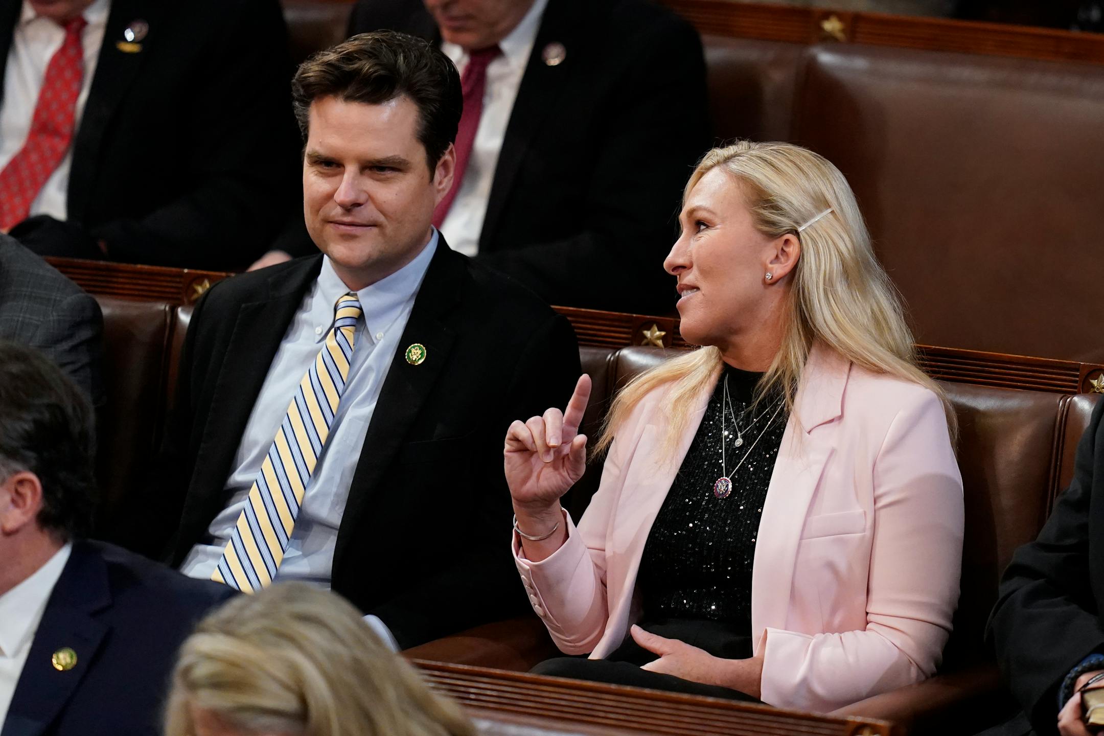 Rep. Marjorie Taylor Greene, R-Ga., talks with Rep. Matt Gaetz, R-Fla., in the House chamber as the House meets for the third day to elect a speaker and convene the 118th Congress in Washington, Thursday, Jan. 5, 2023. (AP Photo/Alex Brandon)