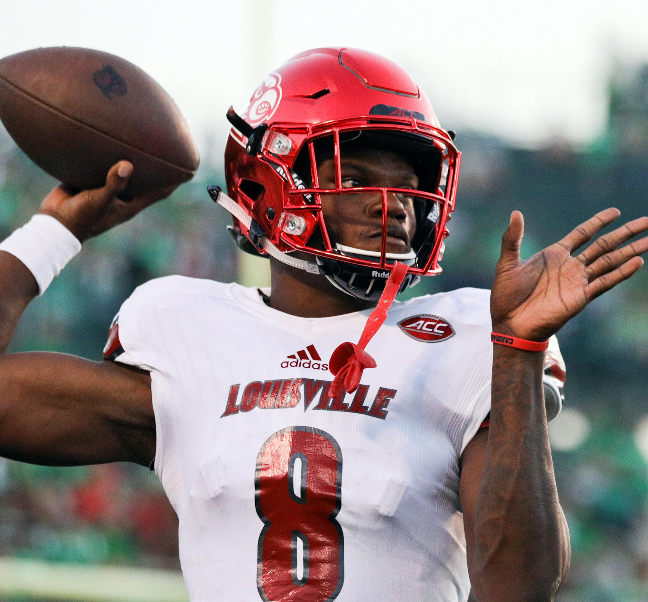 FILE - In this Saturday, Sept. 24, 2016, file photo, Louisville quarterback Lamar Jackson (8) warms up before an NCAA college football game against Marshall in Huntington, W. Va. Another Atlantic Division showdown, this time between No. 3 Louisville and No. 5 Clemson, plus a matchup of Wake Forestís defense and NC Stateís efficient offense and Syracuseís chance to upset Notre Dame headline Week 5 in the Atlantic Coast Conference. (AP Photo/Walter Scriptunas II, File ORG XMIT: NY15