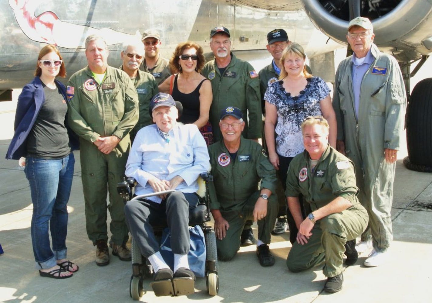 Larry Mullaly and wife Carol at Redwing Airport with crew of Miss Mitchell and other CAFMN members. Photo by Jerry Goodrich
