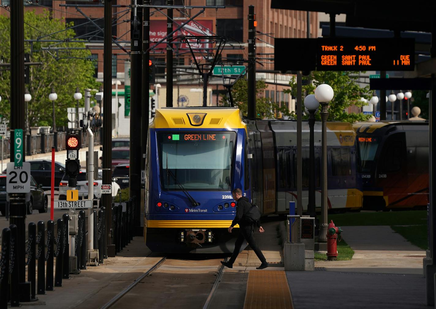 A Green Line train left the Robert Street Station
in St. Paul Friday afternoon. ] ANTHONY SOUFFLE &#x2022; anthony.souffle@startribune.com Passengers rode the Green Line train Friday, May 17, 2019 between Minneapolis and St. Paul, Minn. Metro Transit announced on Friday it will stop running Green Line trains in the early morning hours on week nights. Instead, service will be offered via buses running along the route between 2-4 am on weekdays. The trains will run 24 hours a day on the weekends.