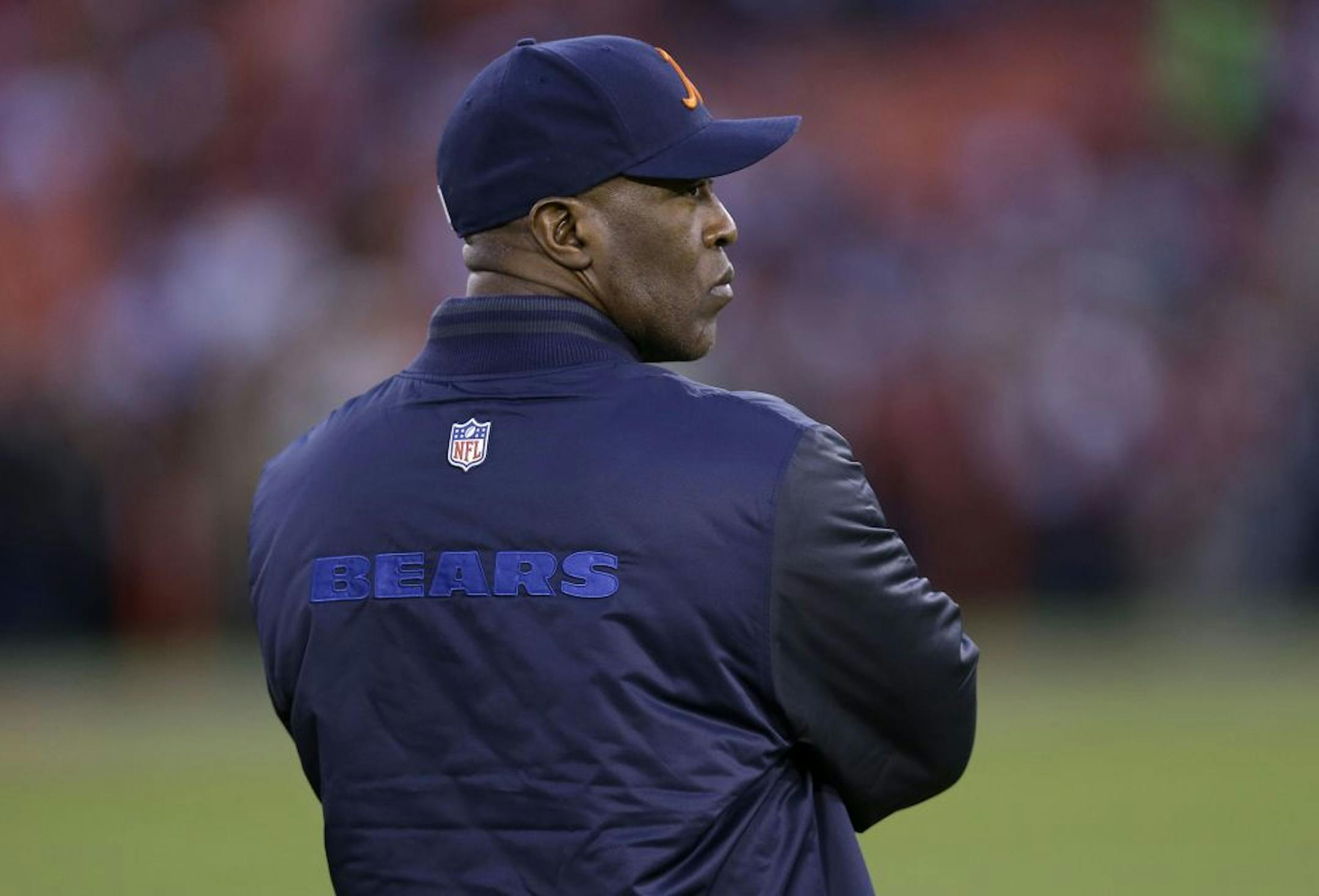 Chicago Bears head coach Lovie Smith watches warm ups before an NFL football game against the San Francisco 49ers in San Francisco, Monday, Nov. 19, 2012.