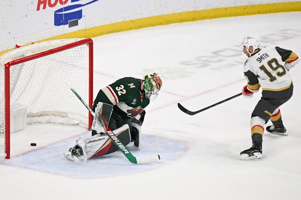 Vegas Golden Knights right wing Reilly Smith scores the game-winning goal against Minnesota Wild goaltender Filip Gustavsson during a shootout Monday 