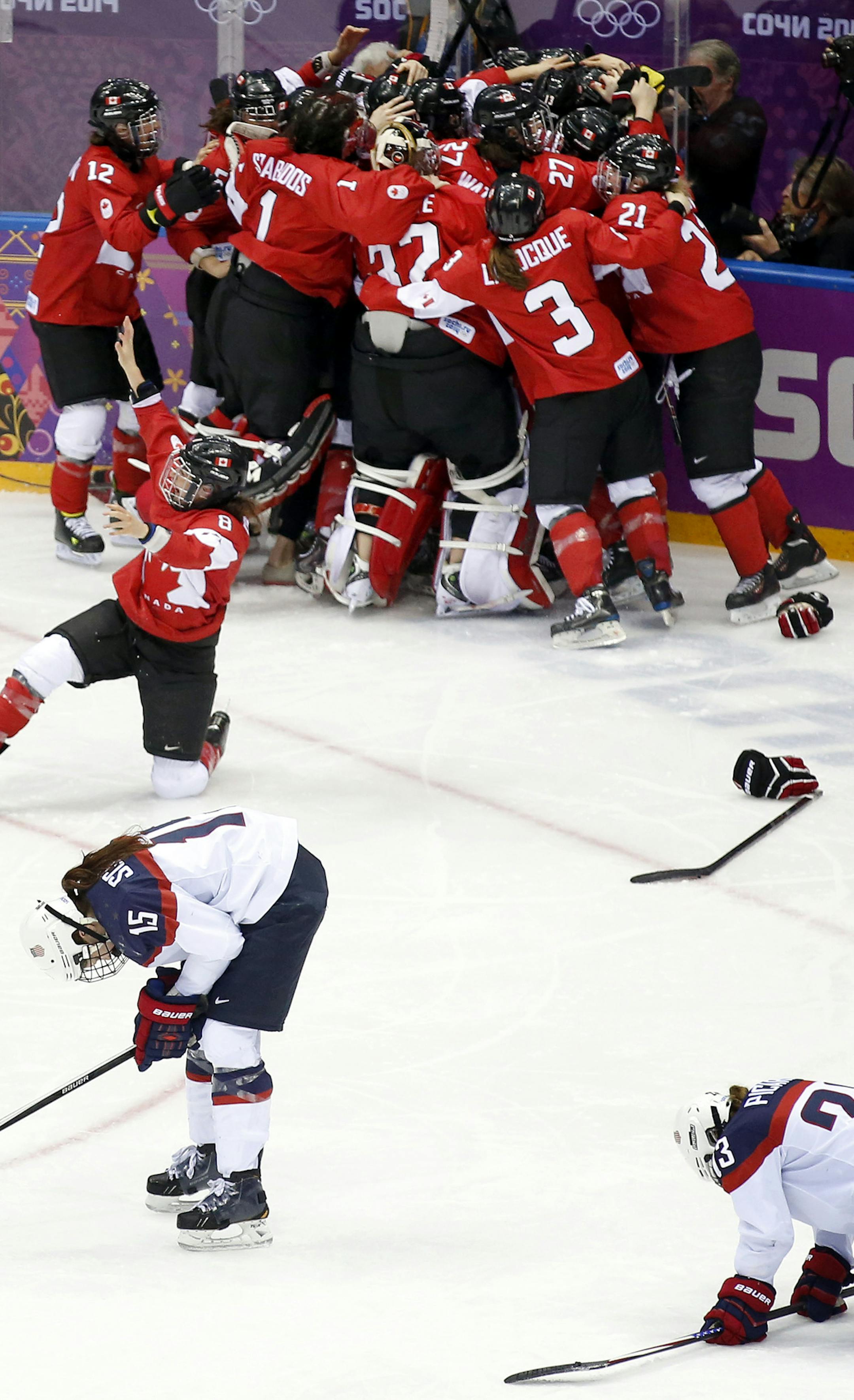 Team Canada celebrated after defeating Team USA in overtime 3-2 to win the gold medal. ] CARLOS GONZALEZ cgonzalez@startribune.com - February 20, 2013, Sochi, Russia, Sochi 2014 Winter Olympics, Bolshoy Ice Dome, women's hockey gold medal game, USA vs. Canada