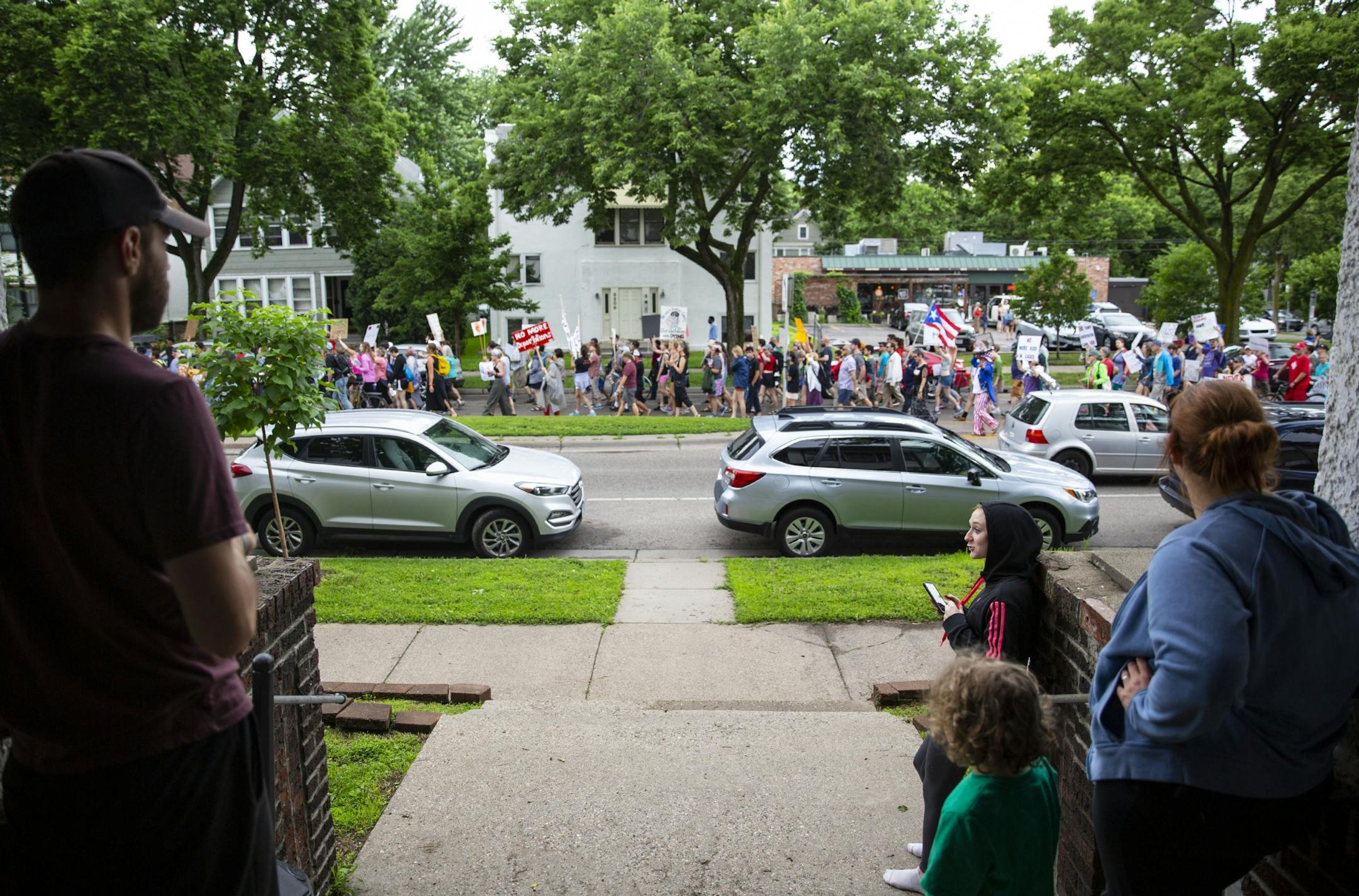 Thousands of protestors march down Minneapolis streets shutting down one way of traffic. ALEX KORMANN ¥ alex.kormann@startribune.com Approximately 1,000 people marched through the streets of Minneapolis on Sunday June 30, 2019 protesting the treatment of migrants on the U.S. border. "Stop separating families, close the camps," said Mari Mansfield, an organizer for the event.