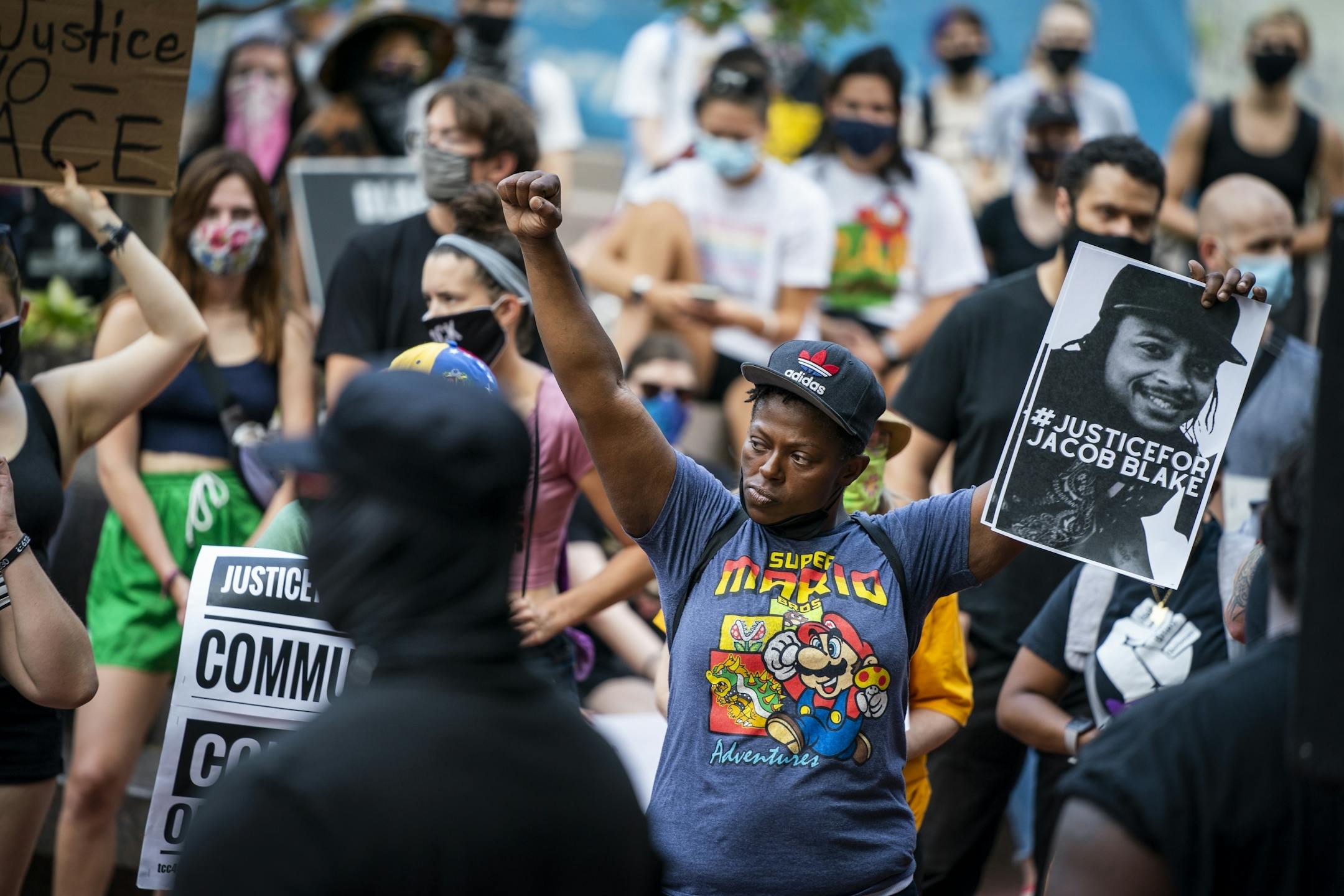 Sistah Revolooshun raised her fist during the rally.