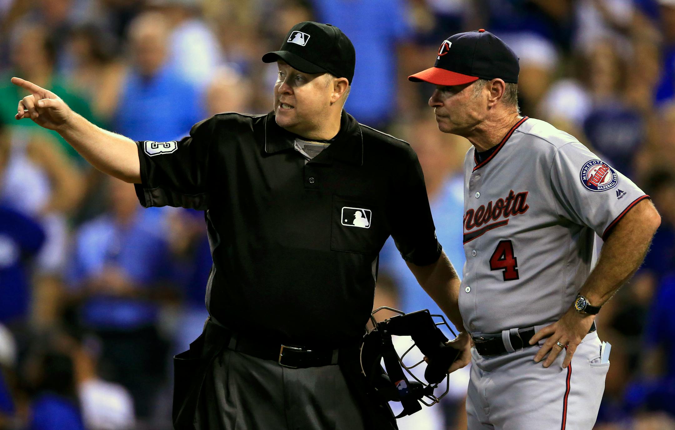 Home plate umpire Todd Tichenor, left, explained a call to Twins manager Paul Molitor during a game against the Kansas City Royals at Kauffman Stadium in August.