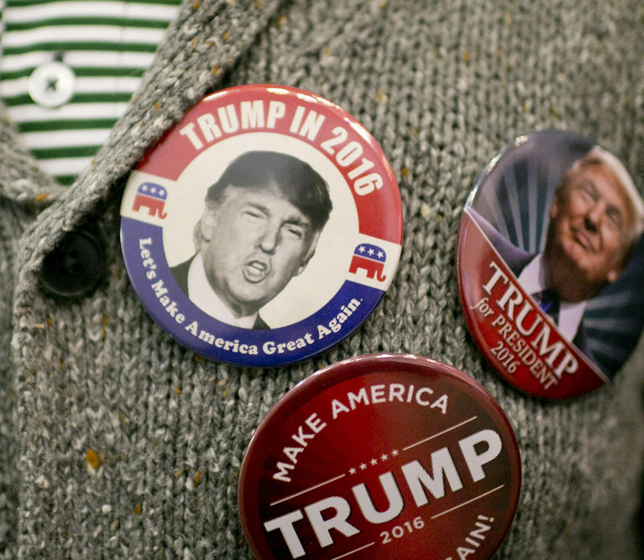 A button-wearing Donald Trump supporter at a campaign rally in Columbus, Ohio, Nov. 23, 2015. Trump’s heated campaign rhetoric has both fired up his supporters and drawn more protesters, resorting in a number of scuffles at rallies which he has mostly embraced as a new and action-packed dimension of the Donald Trump experience. (Andrew Spear/The New York Times) ORG XMIT: MIN2015121113154322