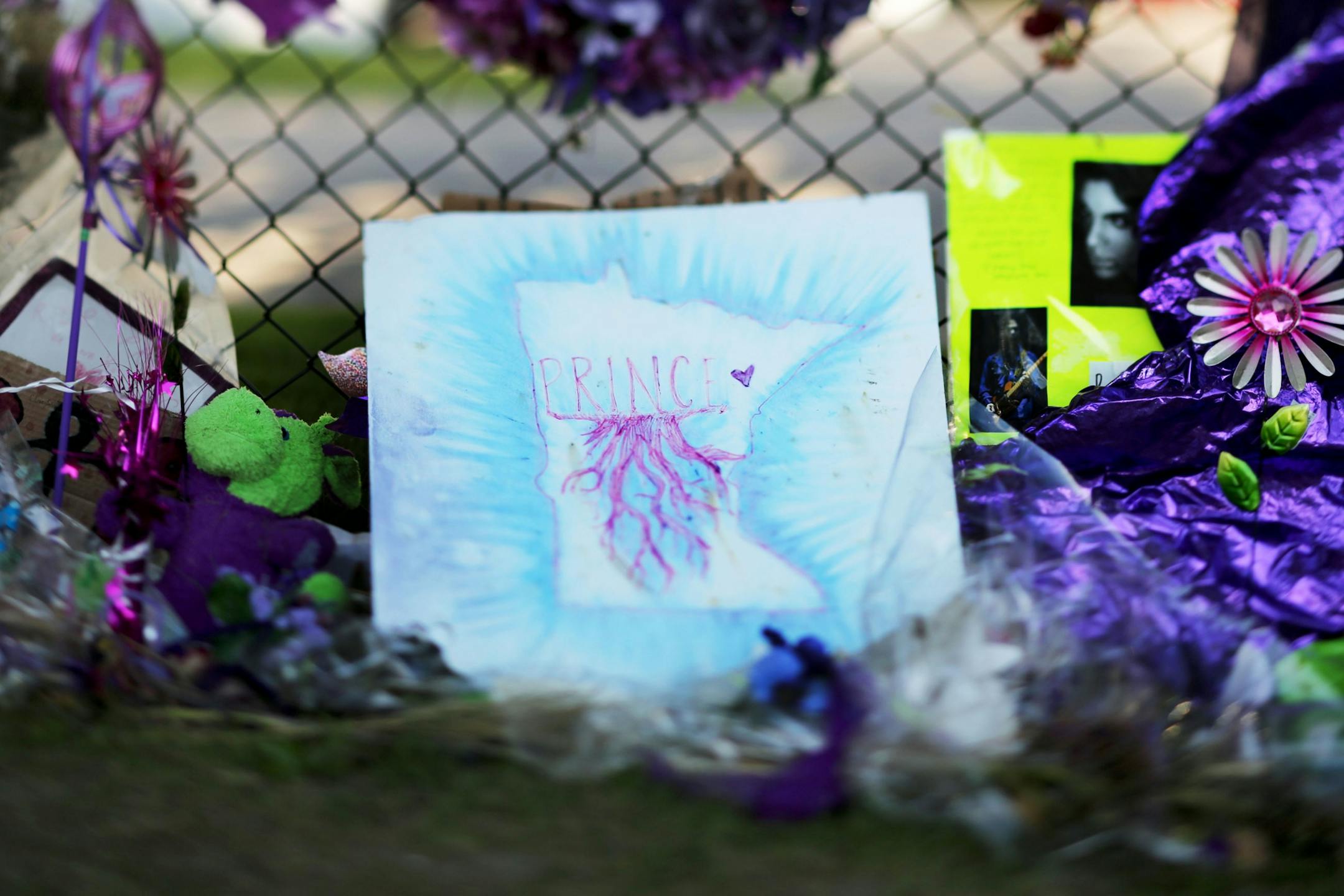 A painting from a Prince fan left outside by Paisley Park Sunday, May 15, 2016, in Chanhassen, MN.