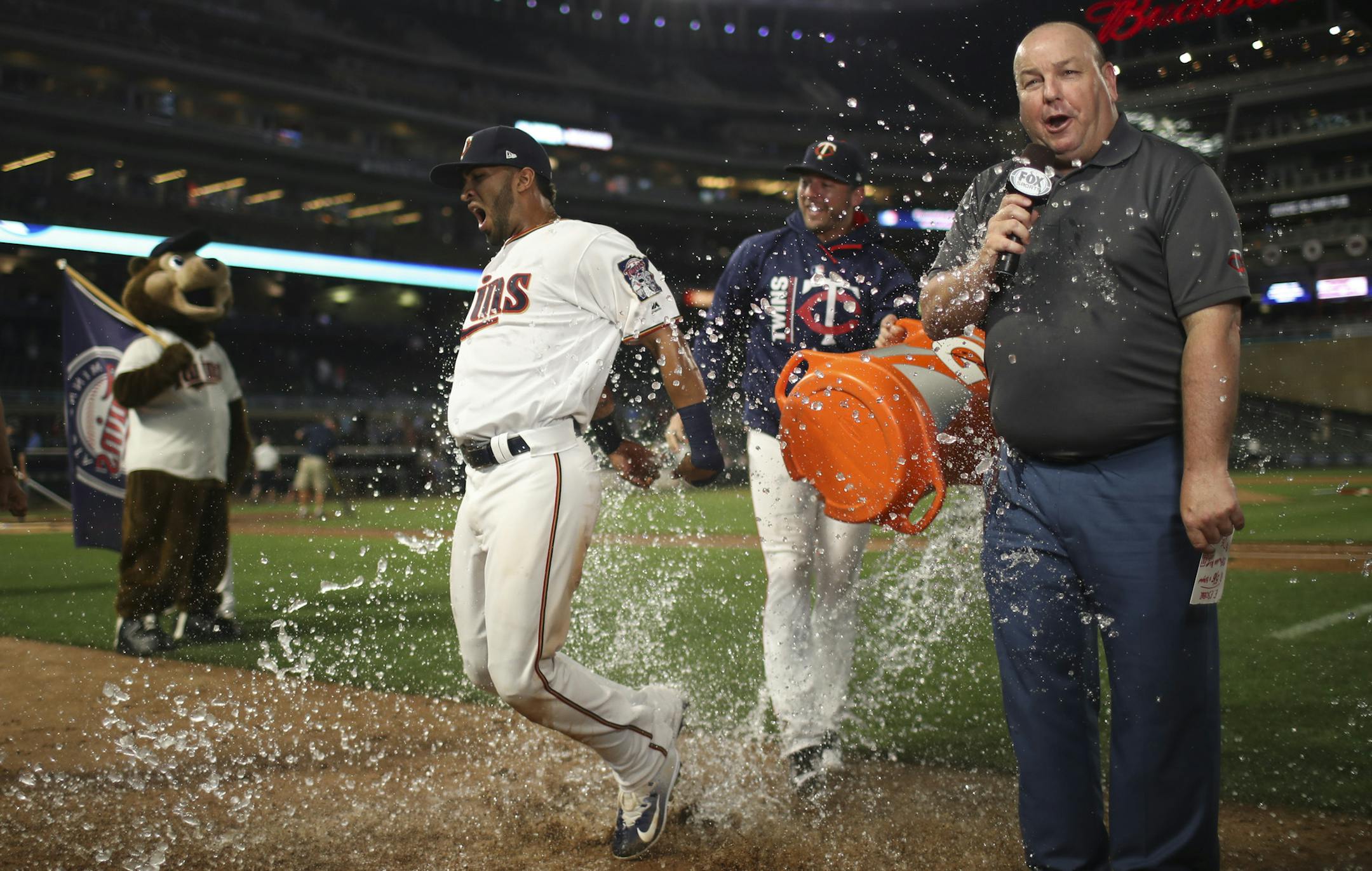 Minnesota Twins left fielder Eddie Rosario earned an ice water shower from teammate relief pitcher Brandon Kintzler at the conclusion of his post-game interview after his three home run performance Wednesday night. ] JEFF WHEELER ï jeff.wheeler@startribune.com The Twins beat the Seattle Mariners 20-7 in a 28 hit slugfest Wednesday night, June 13, 2017 at Target Field in Minneapolis.