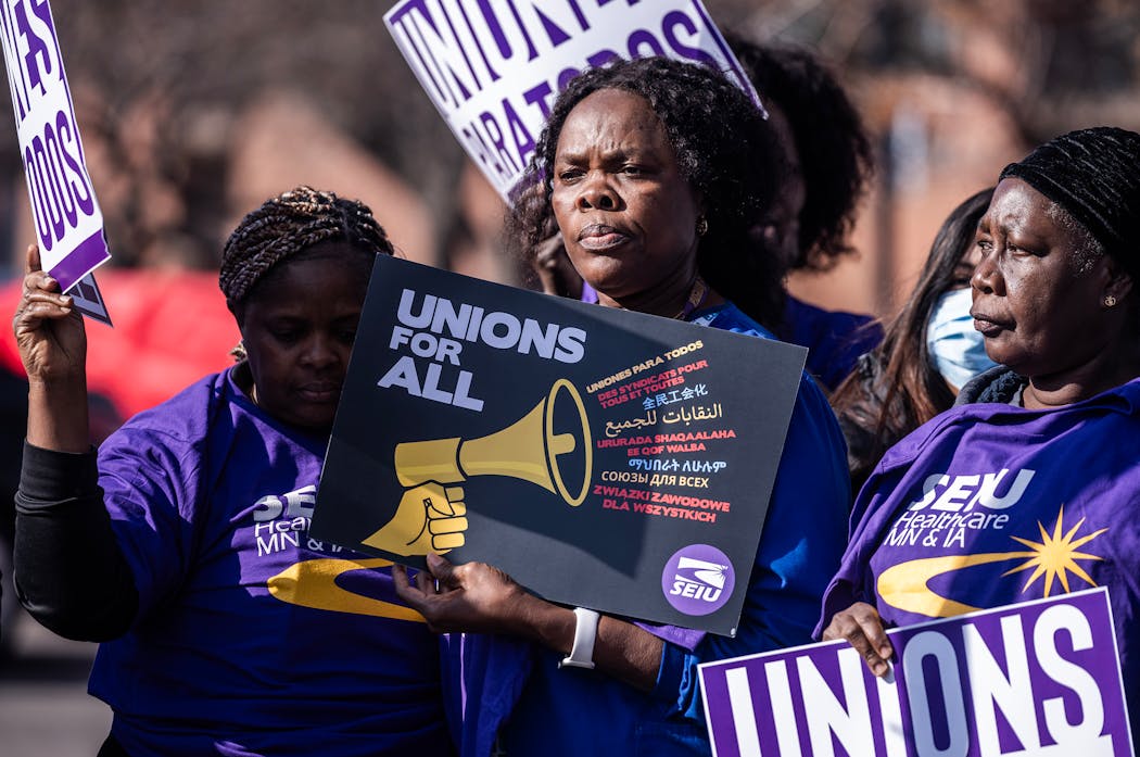 Members of SEIU Health Care Minnesota and Iowa voiced their support for a $25 minimum wage and better benefits.