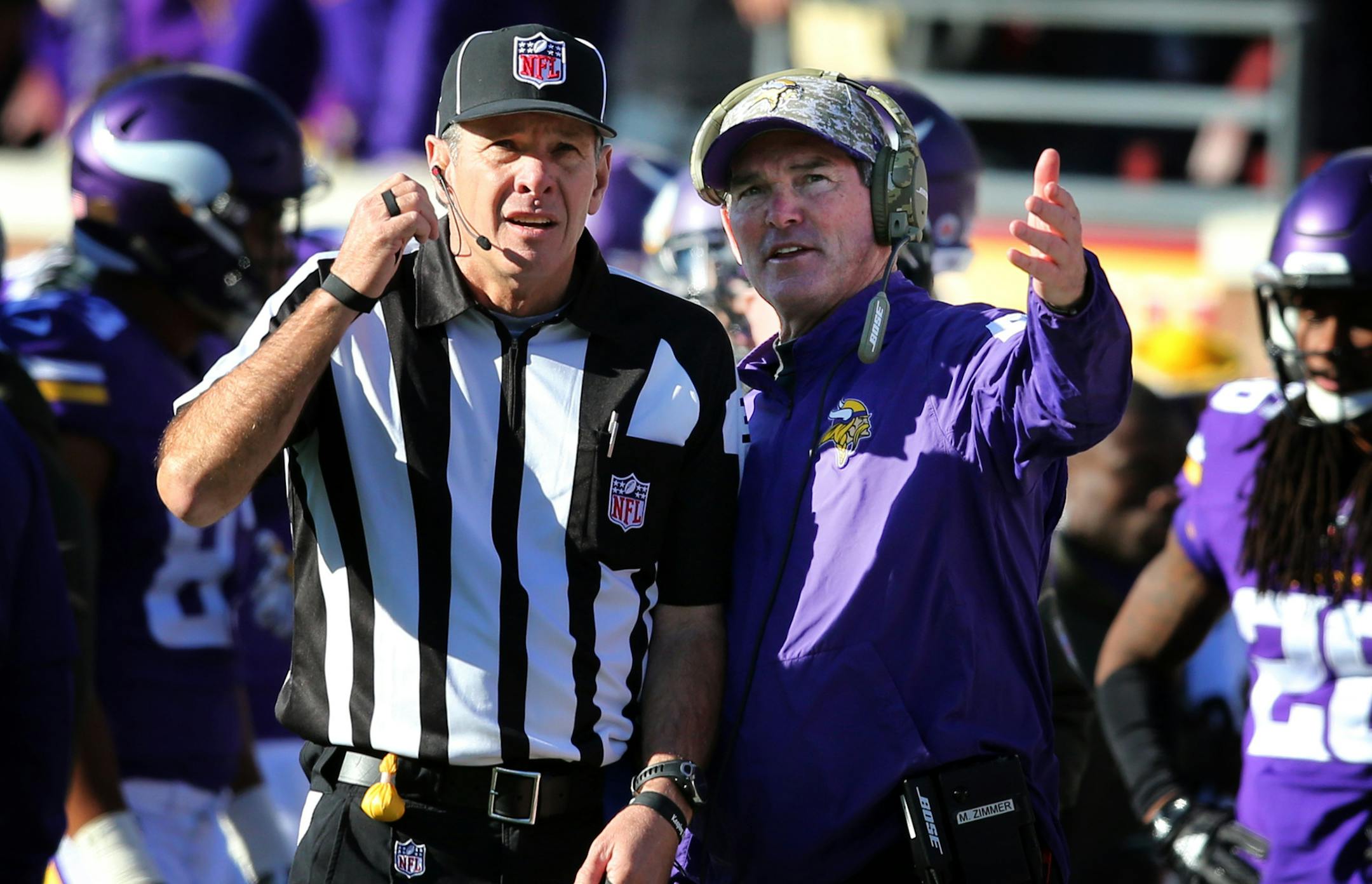 Vikings head coach Mike Zimmer talked with side judge Scott Edwards in the fourth quarter Sunday November 8, 2015.