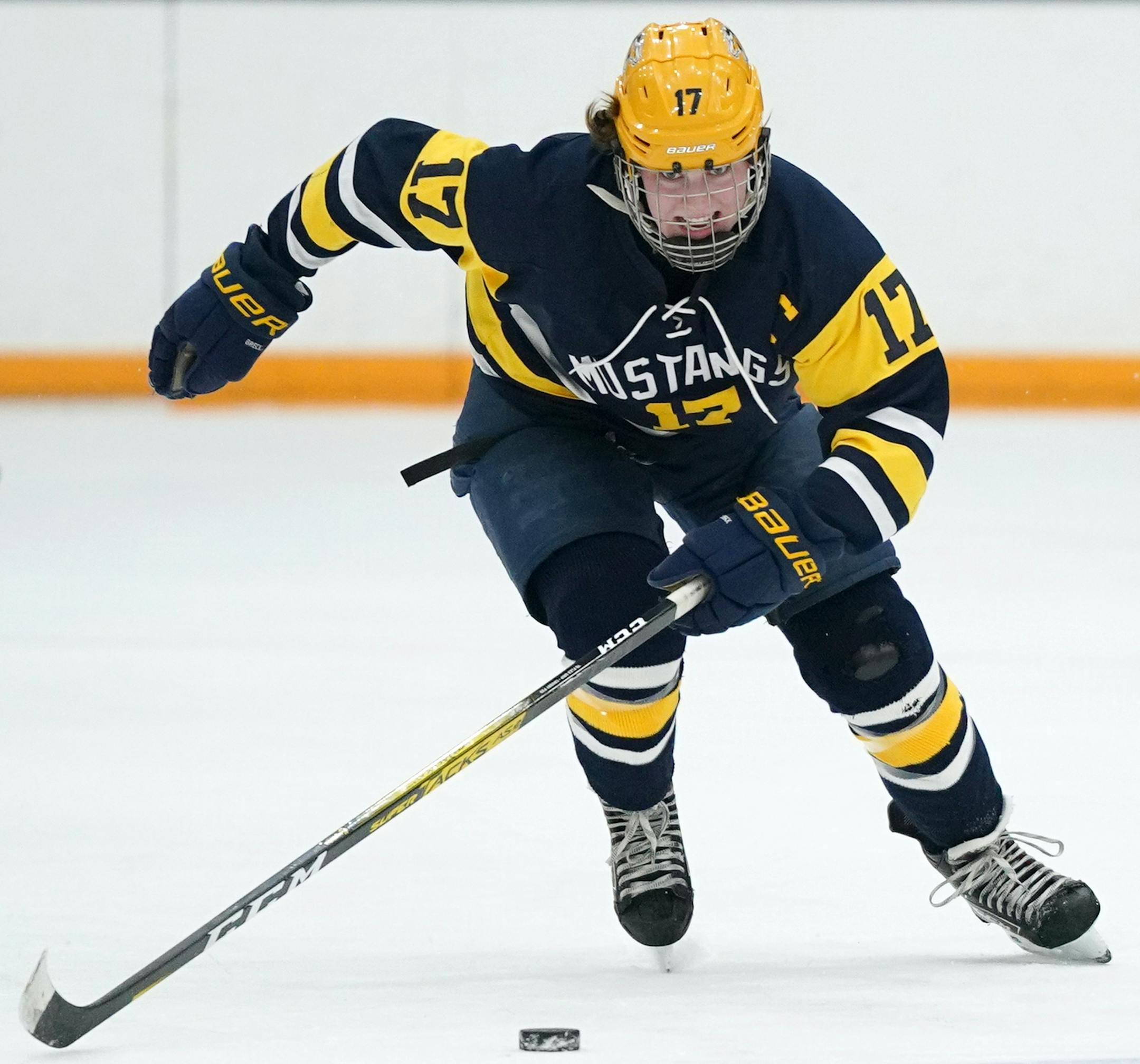 Breck forward Olivia Mobley (17), the girls' hockey metro player of the year, took the puck down the ice during a game against Wayzata. ] ANTHONY SOUFFLE • anthony.souffle@startribune.com Breck forward Olivia Mobley, the girls' hockey metro player of the year, played in a game against Wayzata Friday, Jan. 31, 2020 at the Plymouth Ice Center in Plymouth, Minn.