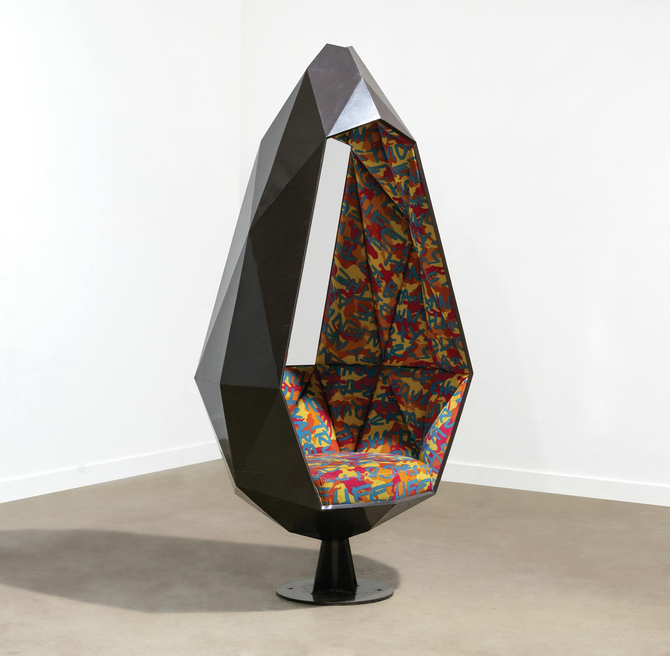 This steel pod chair garnered extra interest from collectors due to its upholstery — a graffiti version of the Declaration of Independence designed by Stephen Sprouse for Knoll. (c) 2023 by Cowles Syndicate Inc.