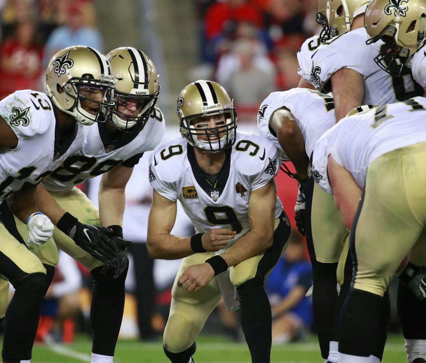 New Orleans Saints quarterback Drew Brees (9) talks in the huddle against the Tampa Bay Buccaneers during an NFL football game Sunday, Dec. 31, 2017, in Tampa, Fla. The Buccaneers won the game 31-24. (Jeff Haynes/AP Images for Panini)