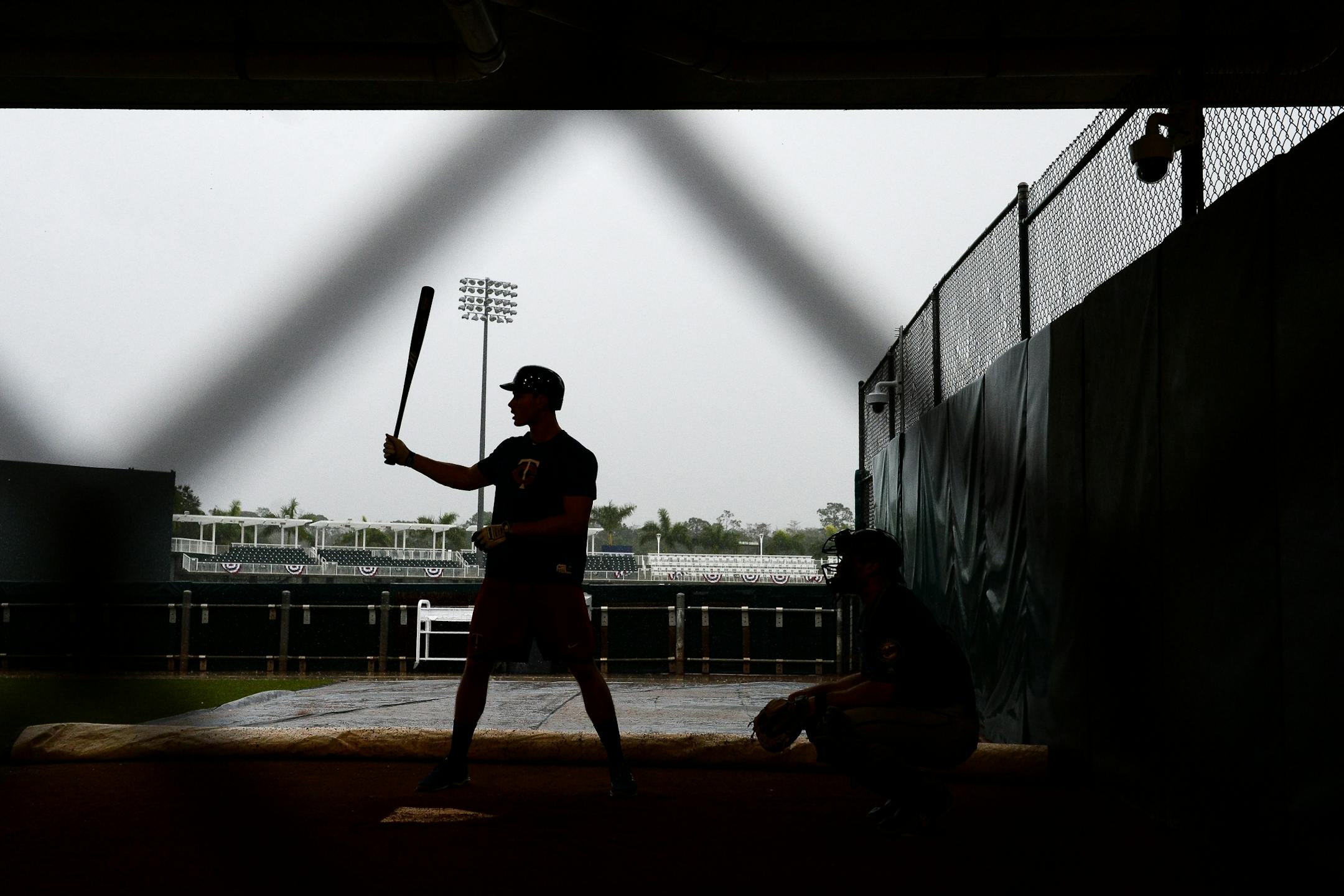 Minnesota Twins right fielder Max Kepler (26) worked on tracking pitches in the bullpen. Rain moved practice into the batting cages and the covered portion of the bullpen Wednesday morning.