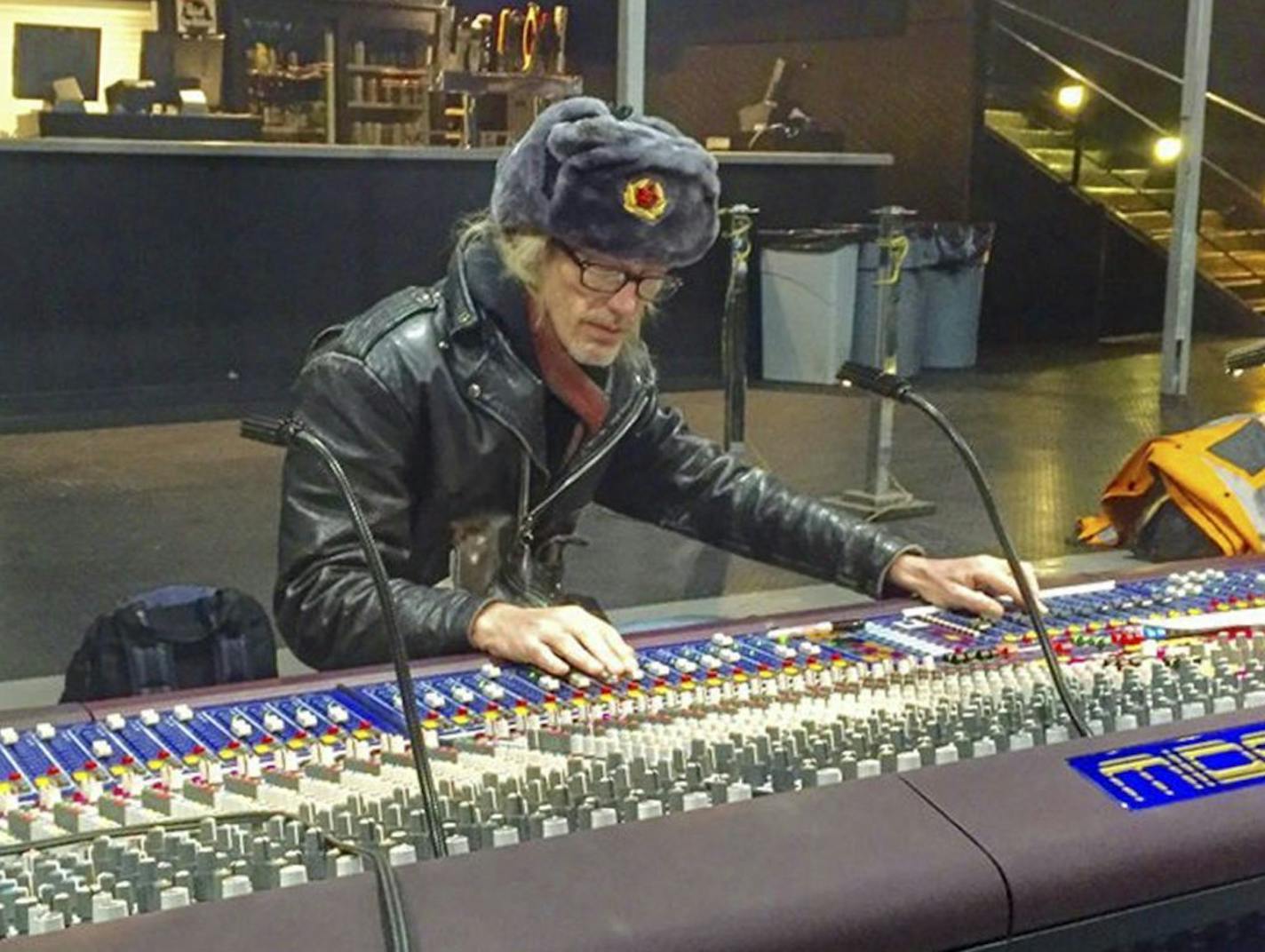 Veteran Twin Cities sound engineer Monty Lee Wilkes, at the First Avenue soundboard before a John Lennon tribute show.