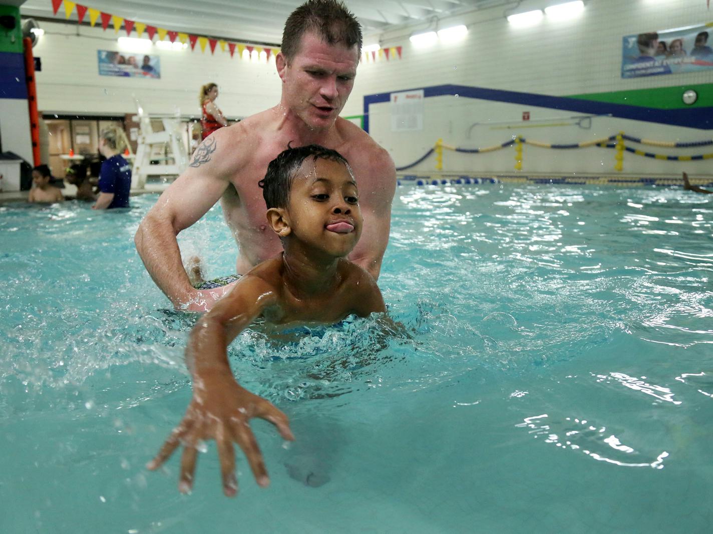 YMCA Safety Around Water program participants, who are fourth graders at Lyndale Community School, including Mohamed Sheikh, who worked on paddling as his teacher Drew Gau assisted during their class Tuesday, May 23, 2017, in Minneapolis, MN.] DAVID JOLES &#xef; david.joles@startribune.com Children of color drown at disproportionate rates than white kids. One big reason is lack of access. Community pools are luxuries many minority neighborhoods don't enjoy. Now the Twin Cities YMCA is really pus