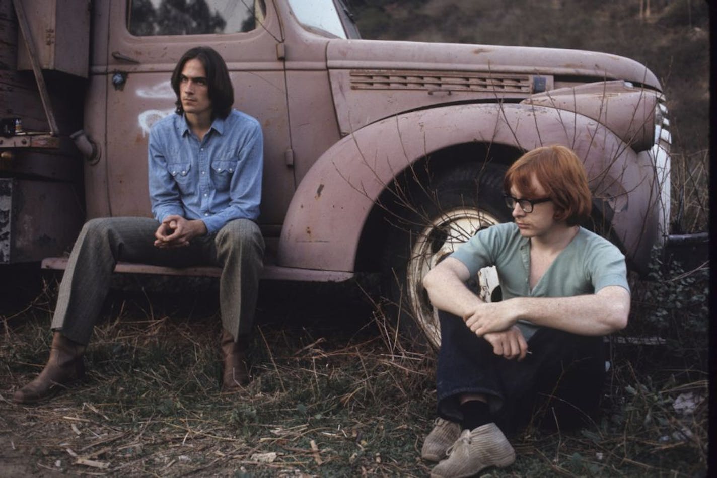 James Taylor and Peter Asher in December 1969, likely the same photo shoot that produced the "Sweet Baby James" LP cover.