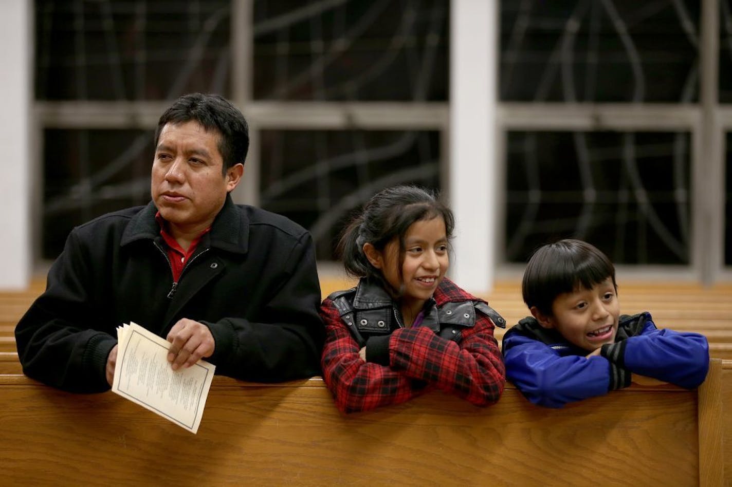 Jacobo Gabriel-Tomas attended a mass with his children in Worthington in 2014. On Tuesday, he crossed the border from Mexico back to Guatemala, leaving his family behind.