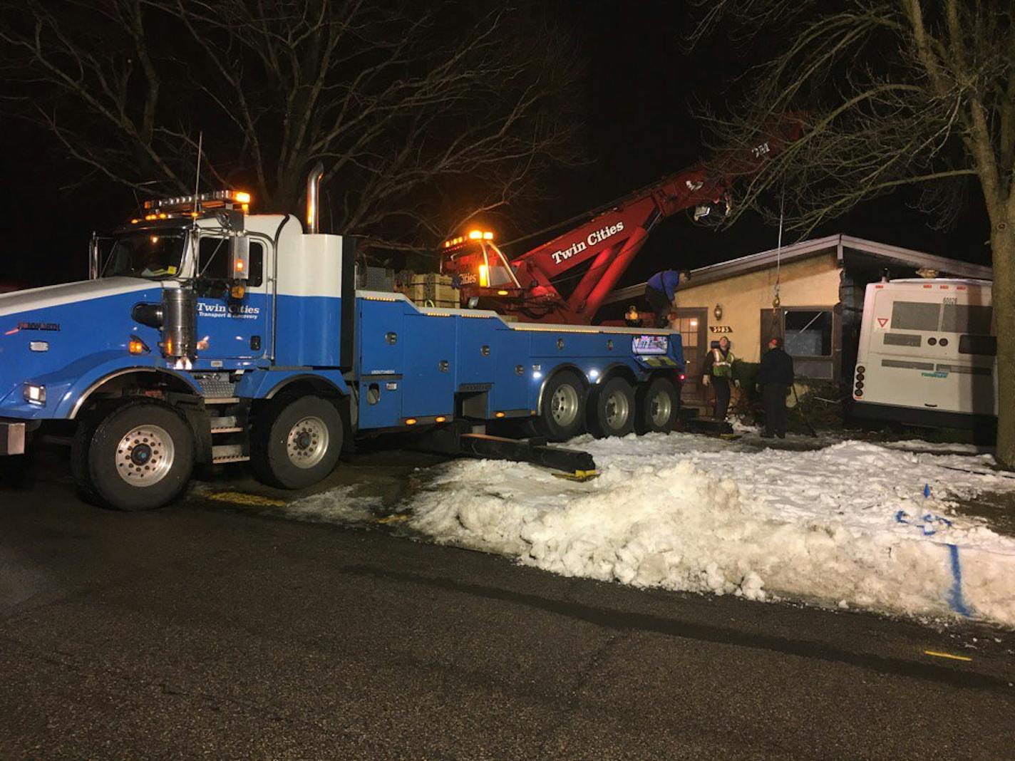 Later Friday, Columbia Heights firefighters said gas to the house had been shut off and crews were preparing to pull the bus out of the house.