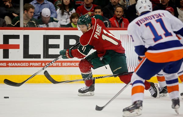 Zach Parise(11) went on the attack Tuesday night against the Islanders.